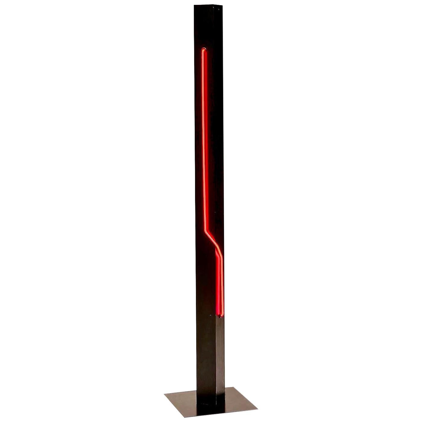 A rare find, this highly collectible neon sculpture standing torchiere lamp is by Rudi Stern who founded the New York Studio and gallery 'Let There Be Neon' in 1972 and was instrumental in the proliferation of neon as an artform in the 1970s and