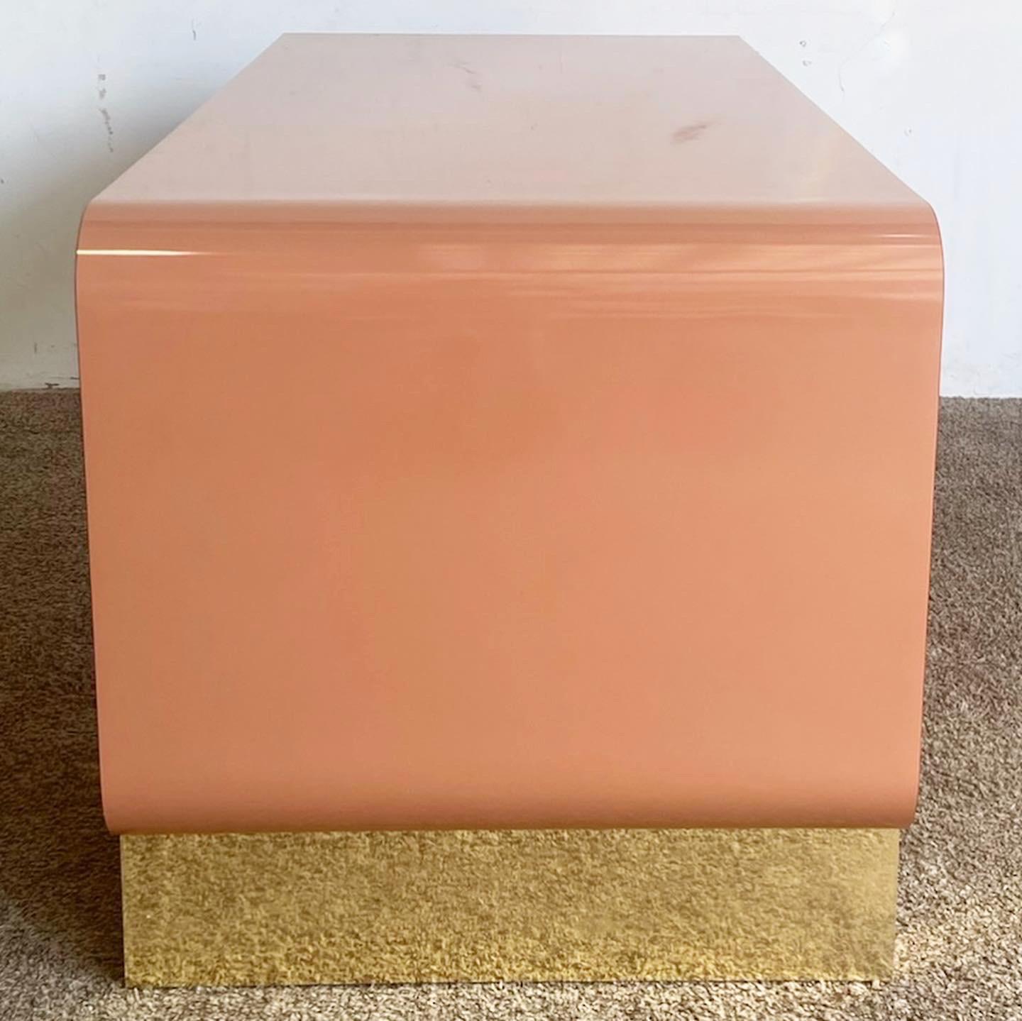 American Postmodern Salmon Lacquer Laminate Waterfall Desk With Gold Base For Sale