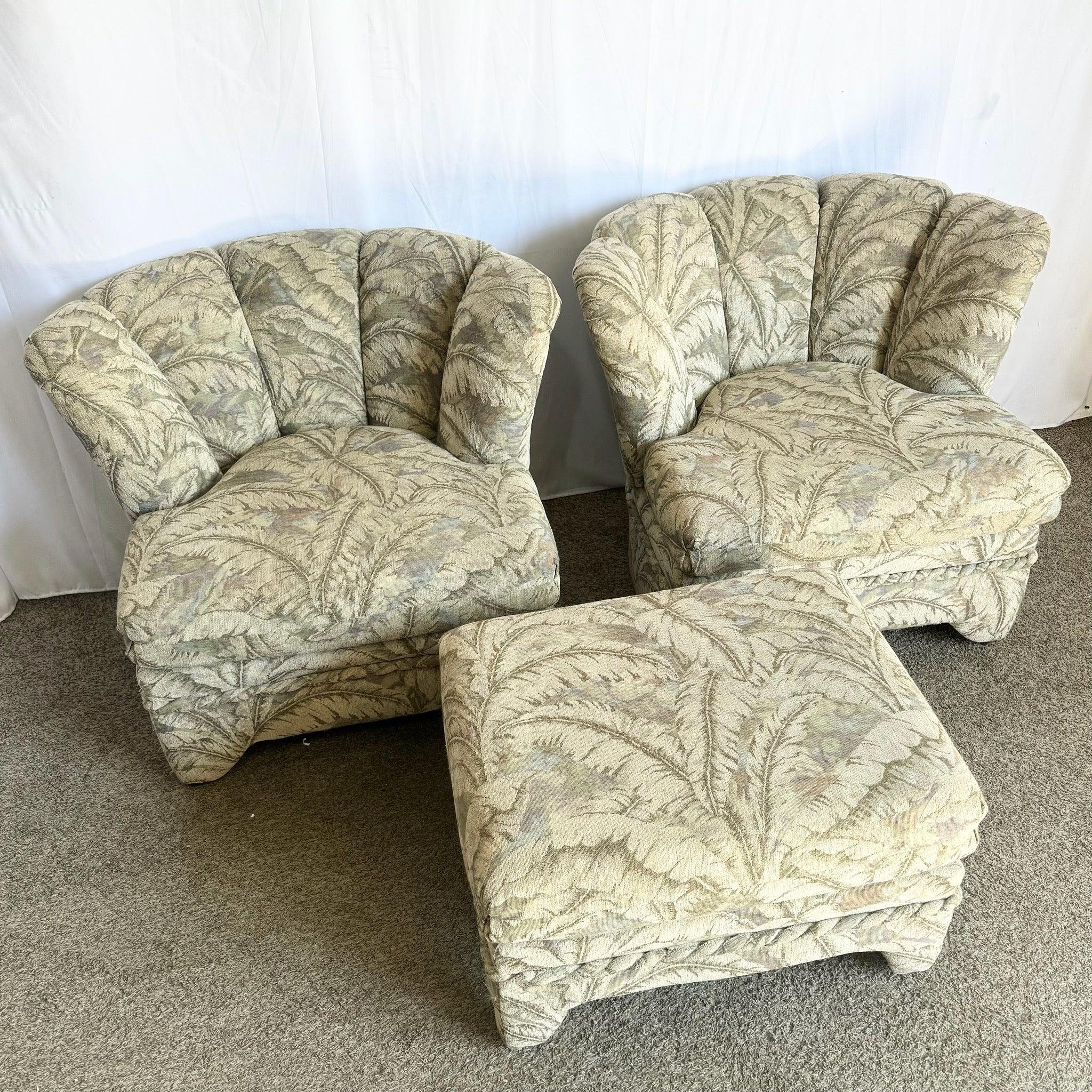 Postmodern lounge set with two scalloped-back chairs and ottoman, upholstered in banana leaf print fabric—perfect for adding retro sophistication to any space.
 
 We sell items as acquired, without restoring or repairing. Vintage pieces may have