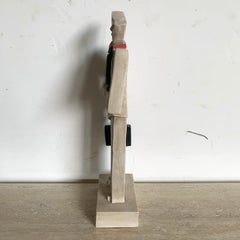 Postmodern Sculpted Business Man With Green Tie and Briefcase