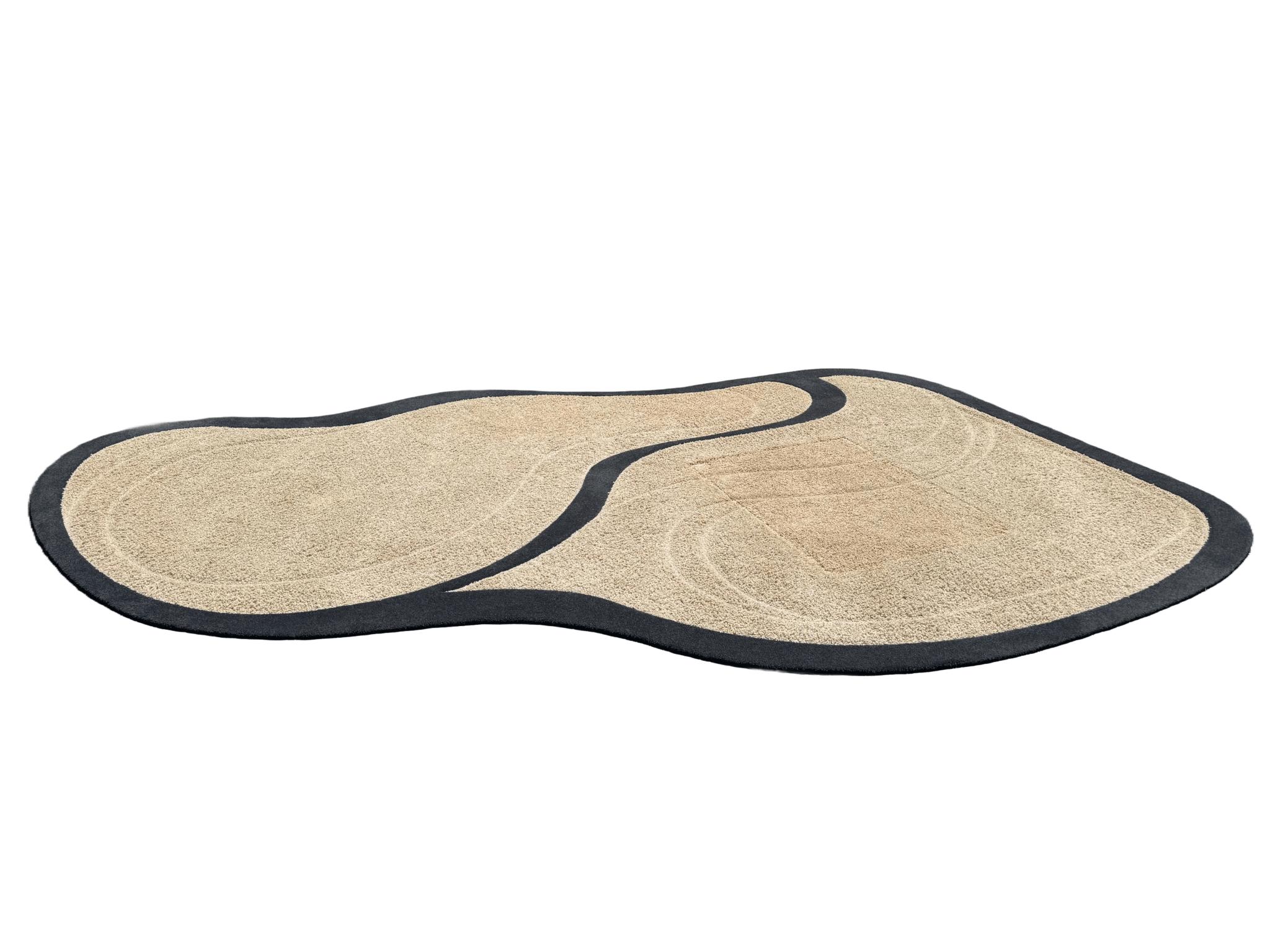 Postmodern tan and black area rug with sculpted, biomorphic shape and carved pile—adds bold 1980s-inspired flair to modern interiors.
 
 We sell items as acquired, without restoring or repairing. Vintage pieces may have age-related wear. Review