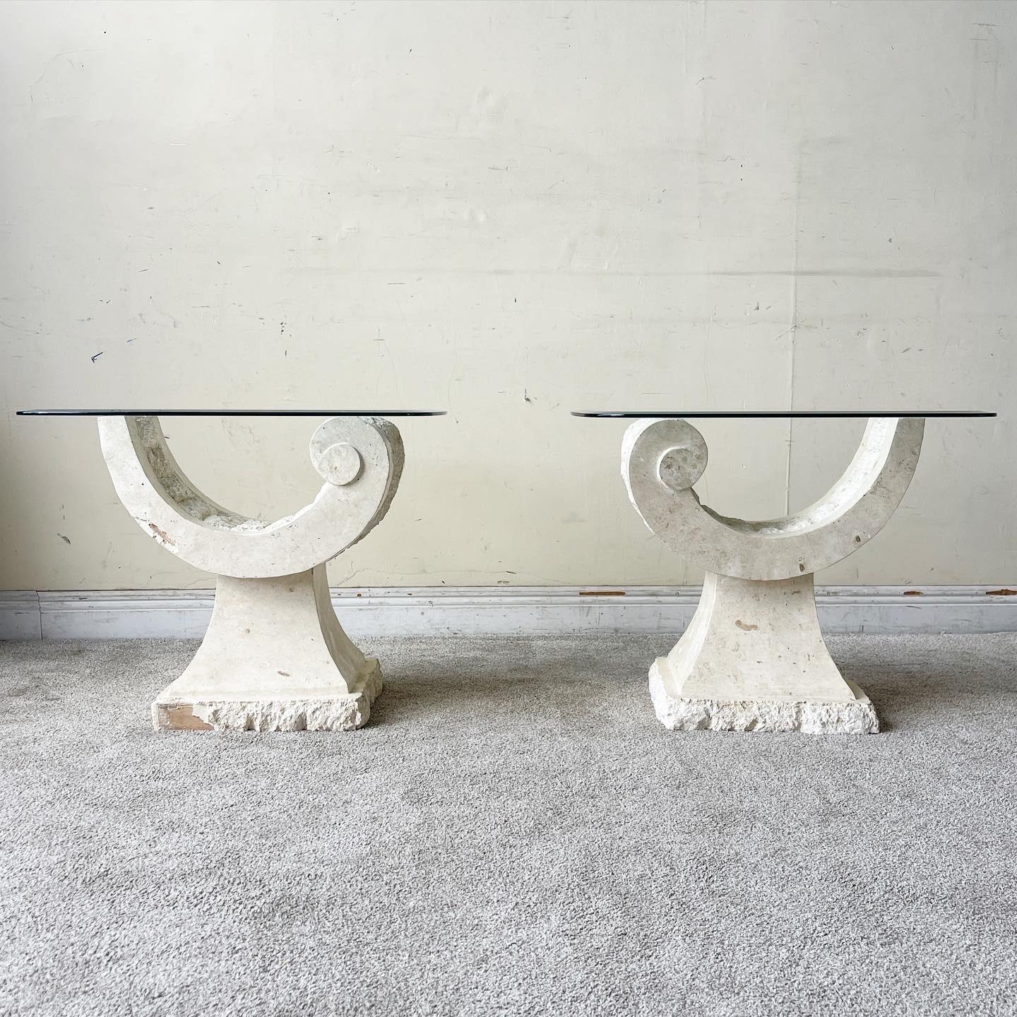 Exceptional pair of vintage postmodern tessellated stone side tables. Each feature a sculpted ribbon base with a beveled glass top.
 