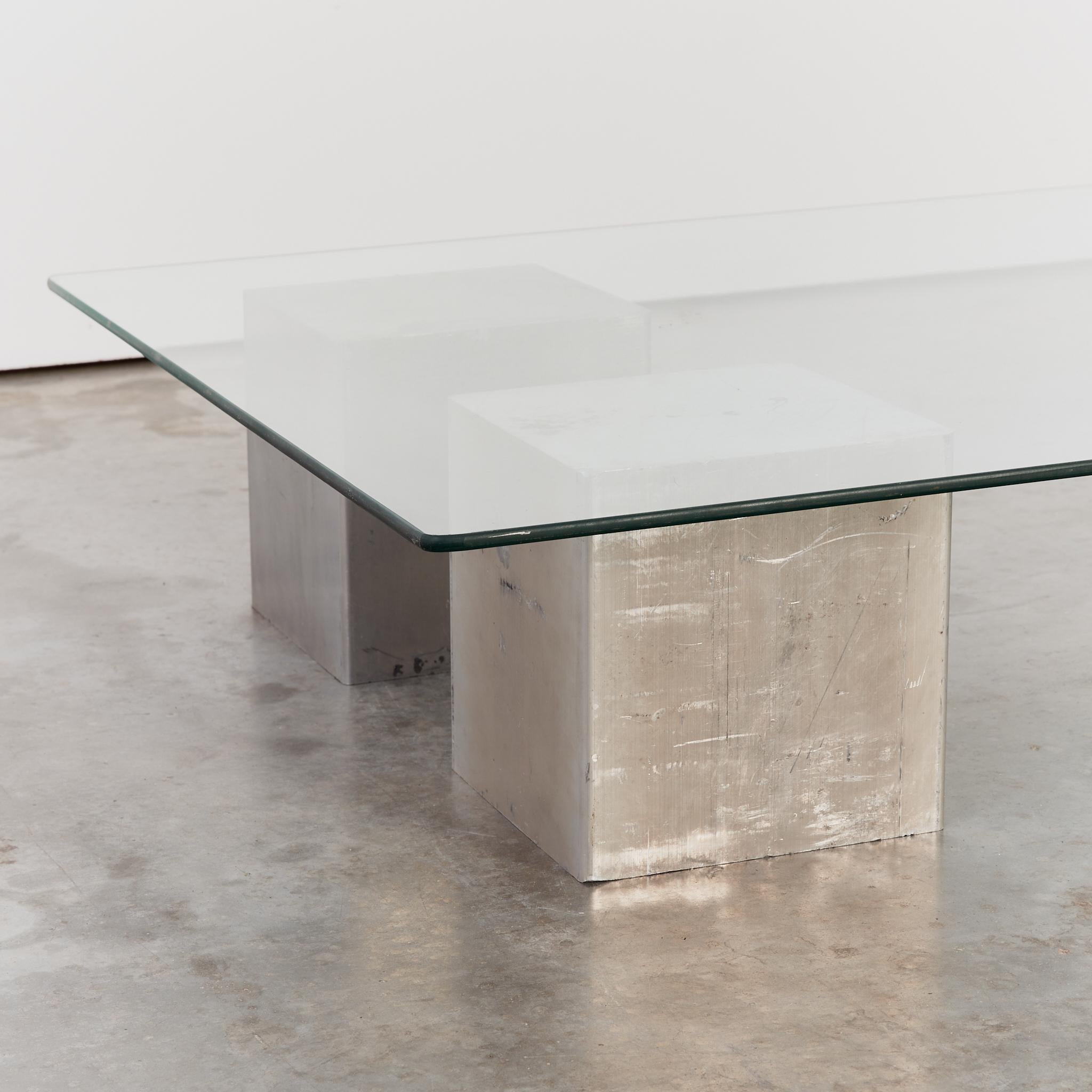 Postmodern sculptural cast aluminium cube and glass coffee table 1