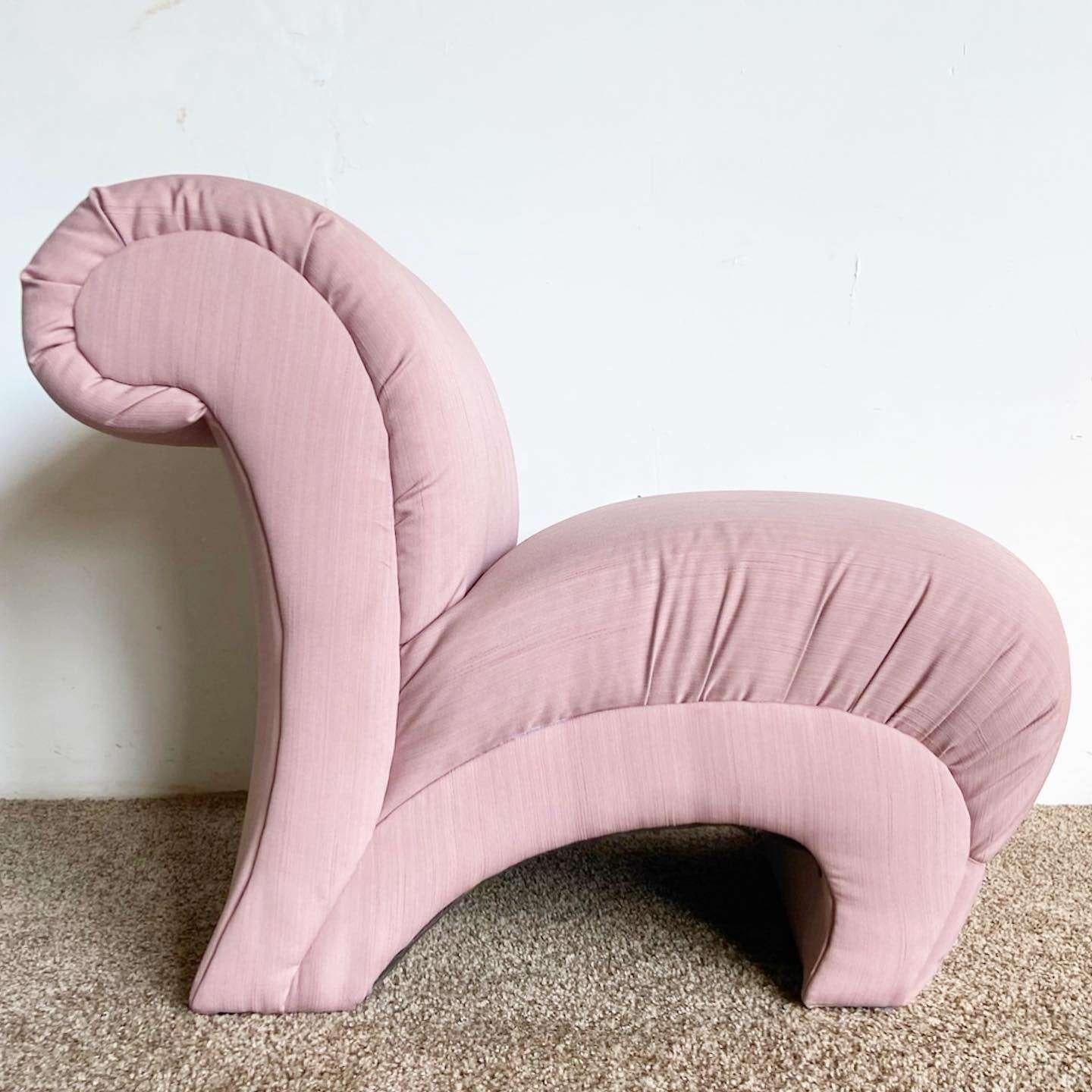 Incredible vintage postmodern sculptural lounge chair/sofa chair. Features a pink fabric throughout.
