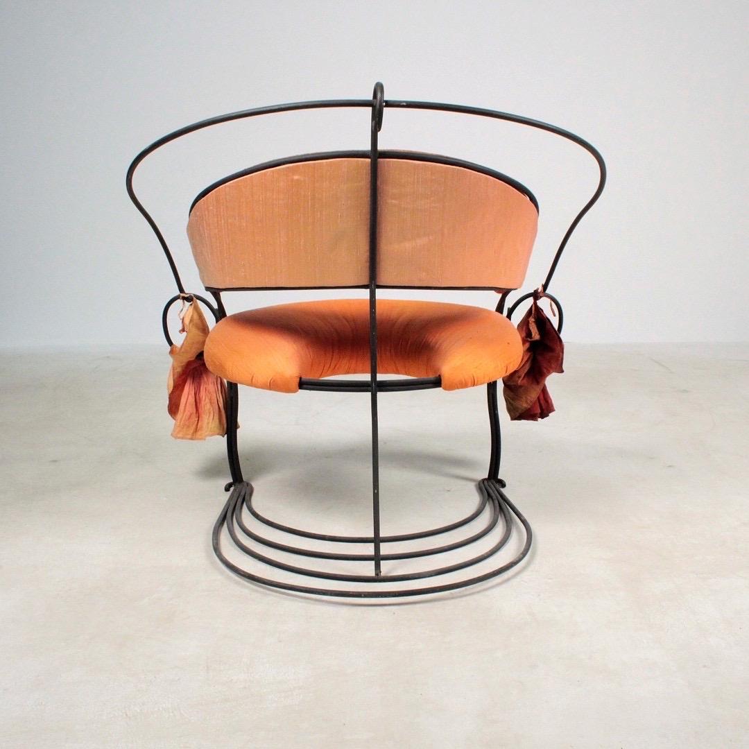Introducing a Rare Italian Post-Modern Armchair from the 1980s

We are delighted to present this stunning Italian Post-Modern armchair, a true work of art from the 1980s. Crafted with precision, it features a black lacquered metal frame and is