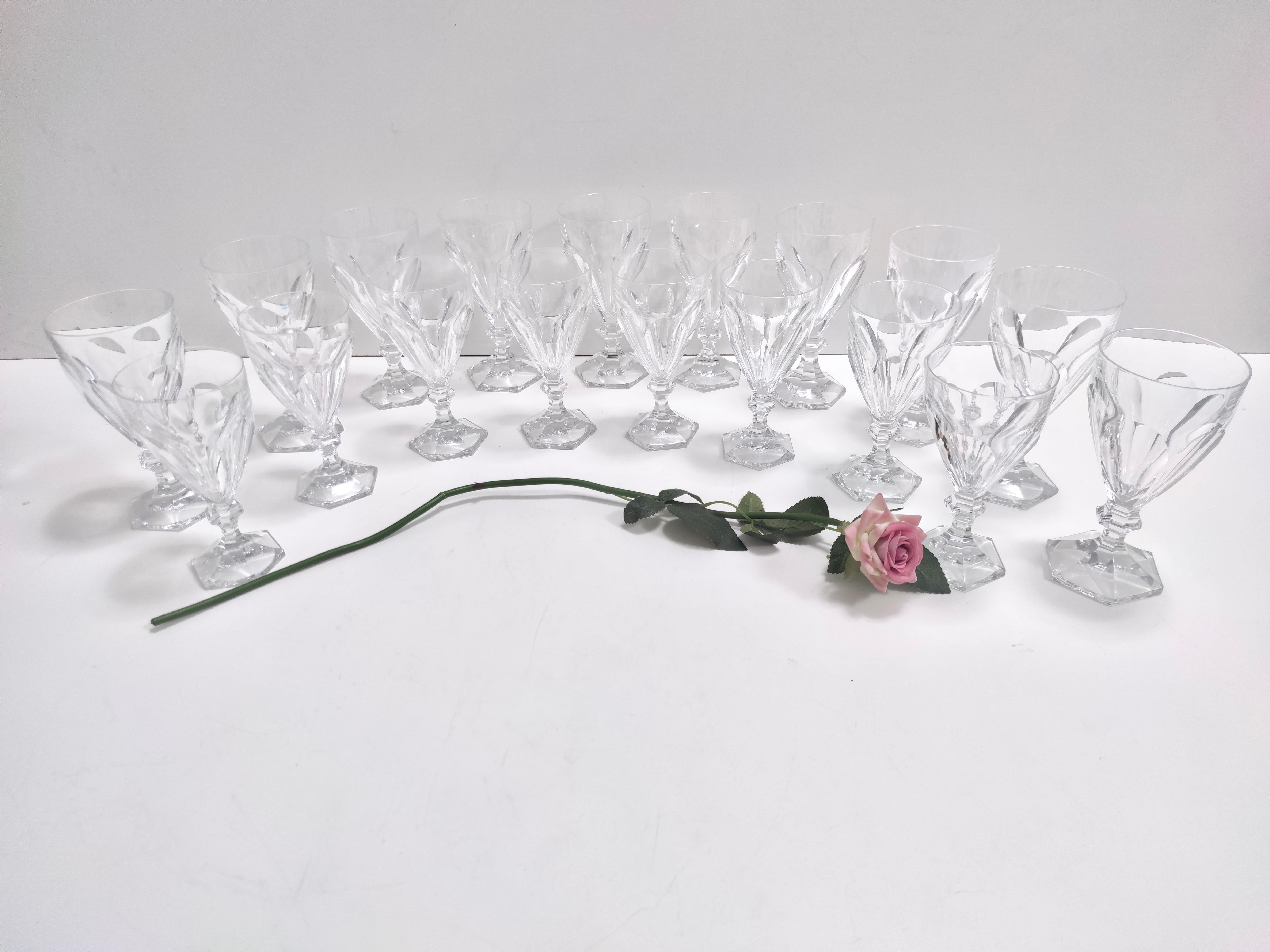 Made in Sweden by Kosta Boda, 1970s. 
These high-quality drinking glasses are made in solid cut crystal, in the style of Baccarat.
Kosta Boda is one of the oldest Swedish glassware company and produces high-quality pieces since 1742. 
It is a