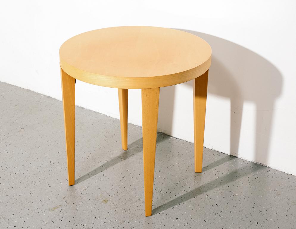 Postmodern round side table in beech and birch veneer. Unsigned, but appears to be studio-built.