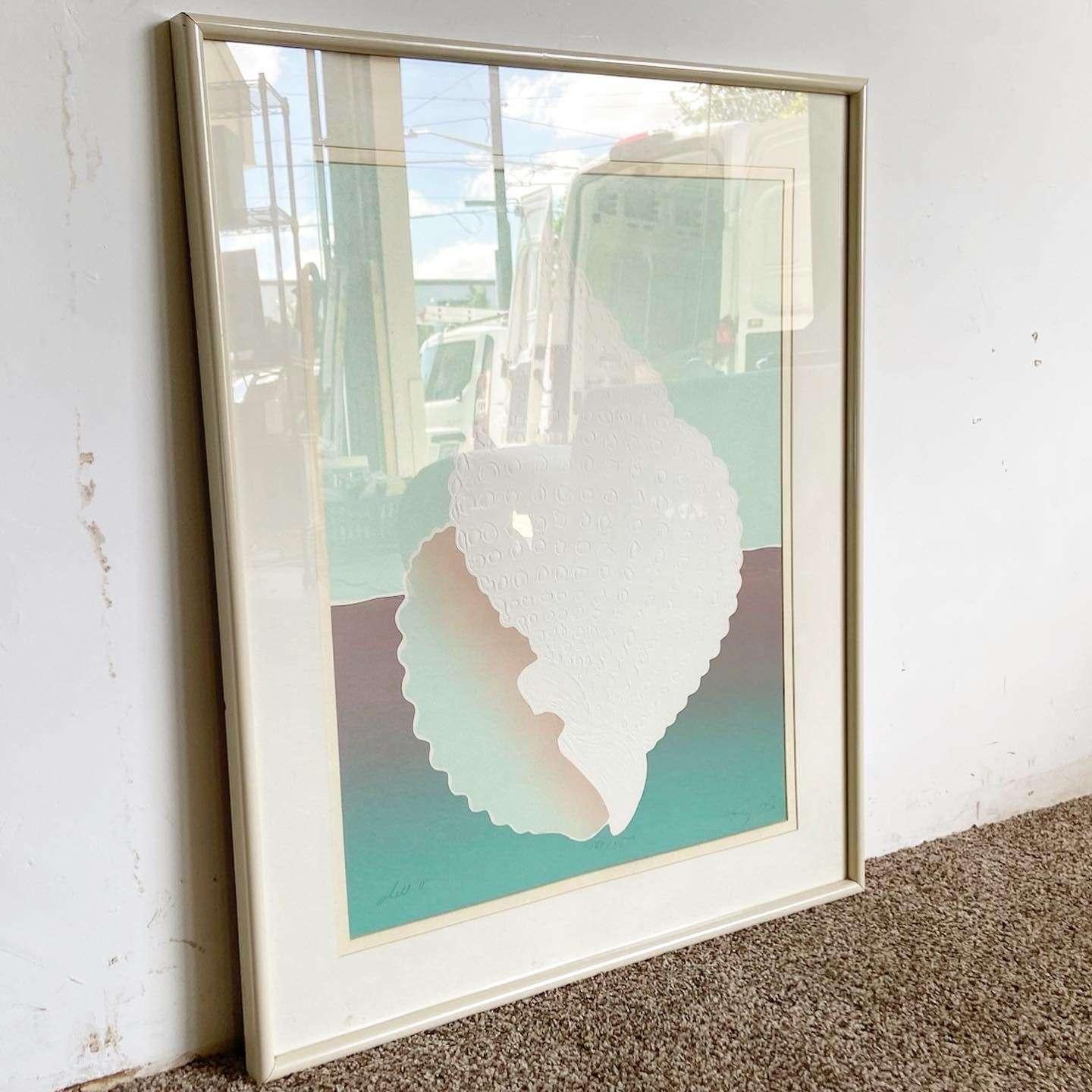 Excellent vintage postmodern framed and signed lithograph titles “Shell”. Displays a brilliant blue and light brown design centering a conch shell.