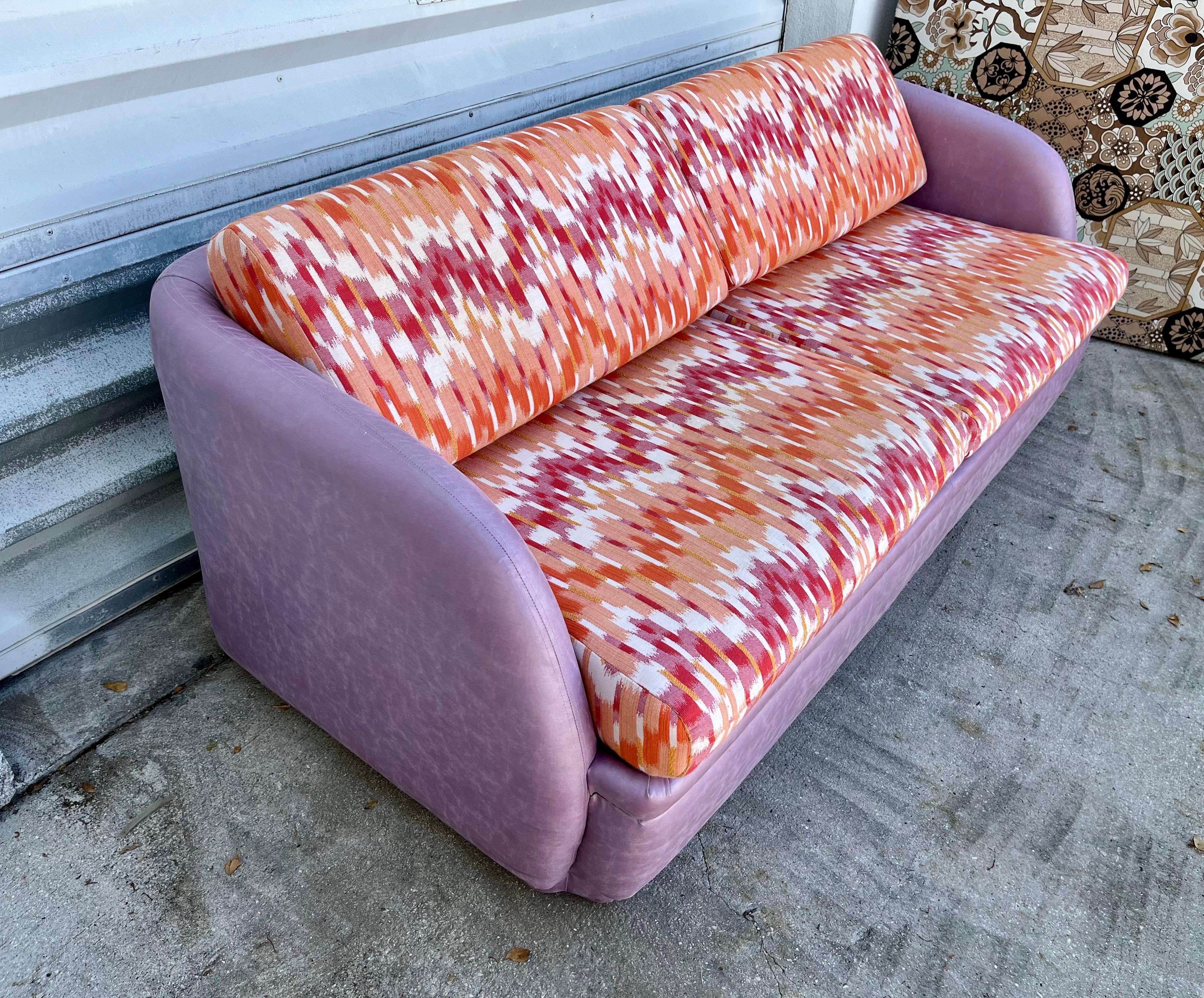 Vintage Postmodern Sleeper Sofa by Thayer Coggin Institutional. Circa 1980s
Features a pull out bed and light purple micro suede like upholstery with a contrasting Missoni Like upholstered removable cushions. 
In excellent near mint original