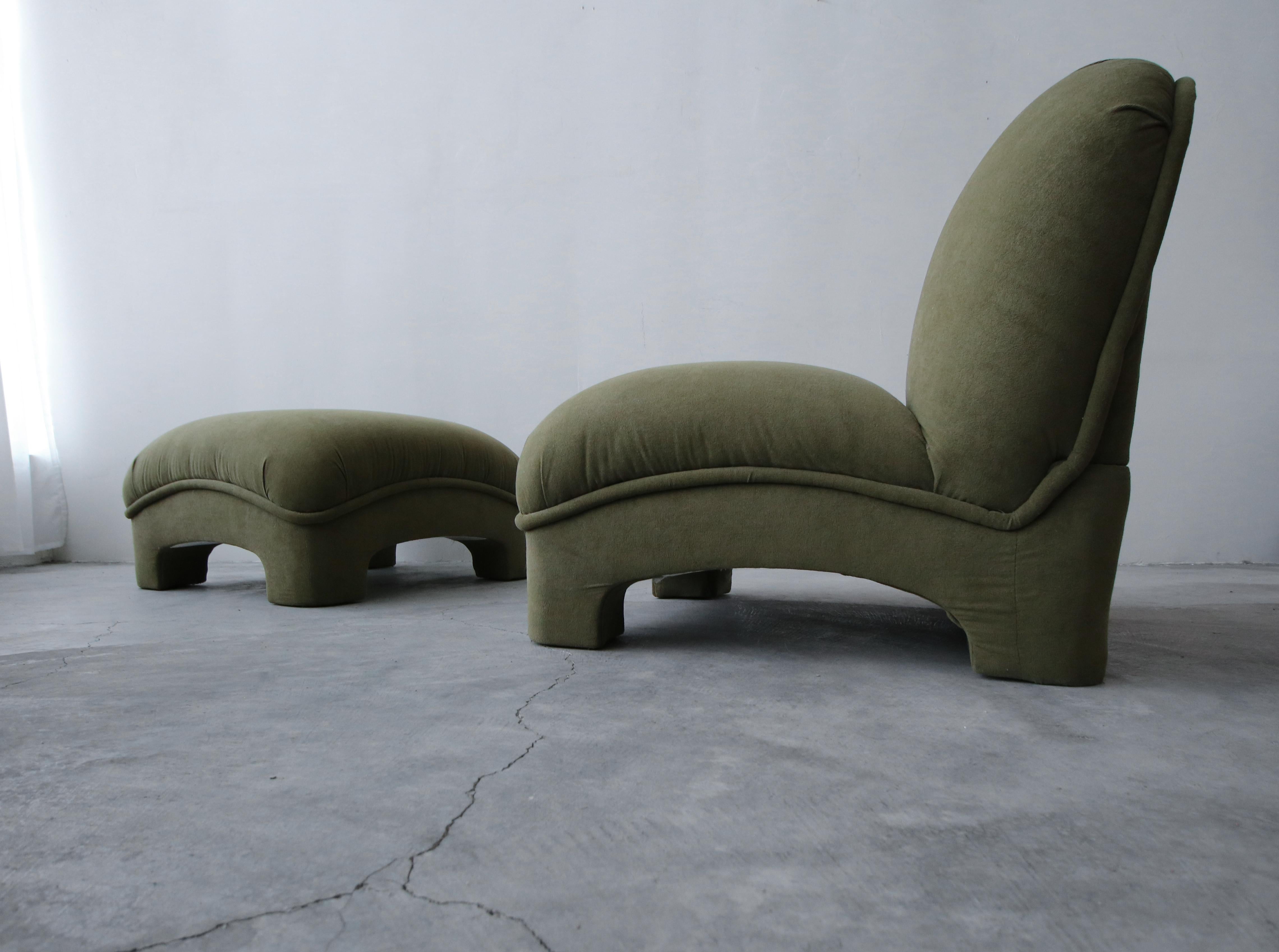 Incredible and large, Postmodern slipper chair with ottoman. This set has lines and curves truly worth coveting.

Kept as found. The pieces are comfortable and structurally sound. Fabric is in overall great condition, could be used as is, but