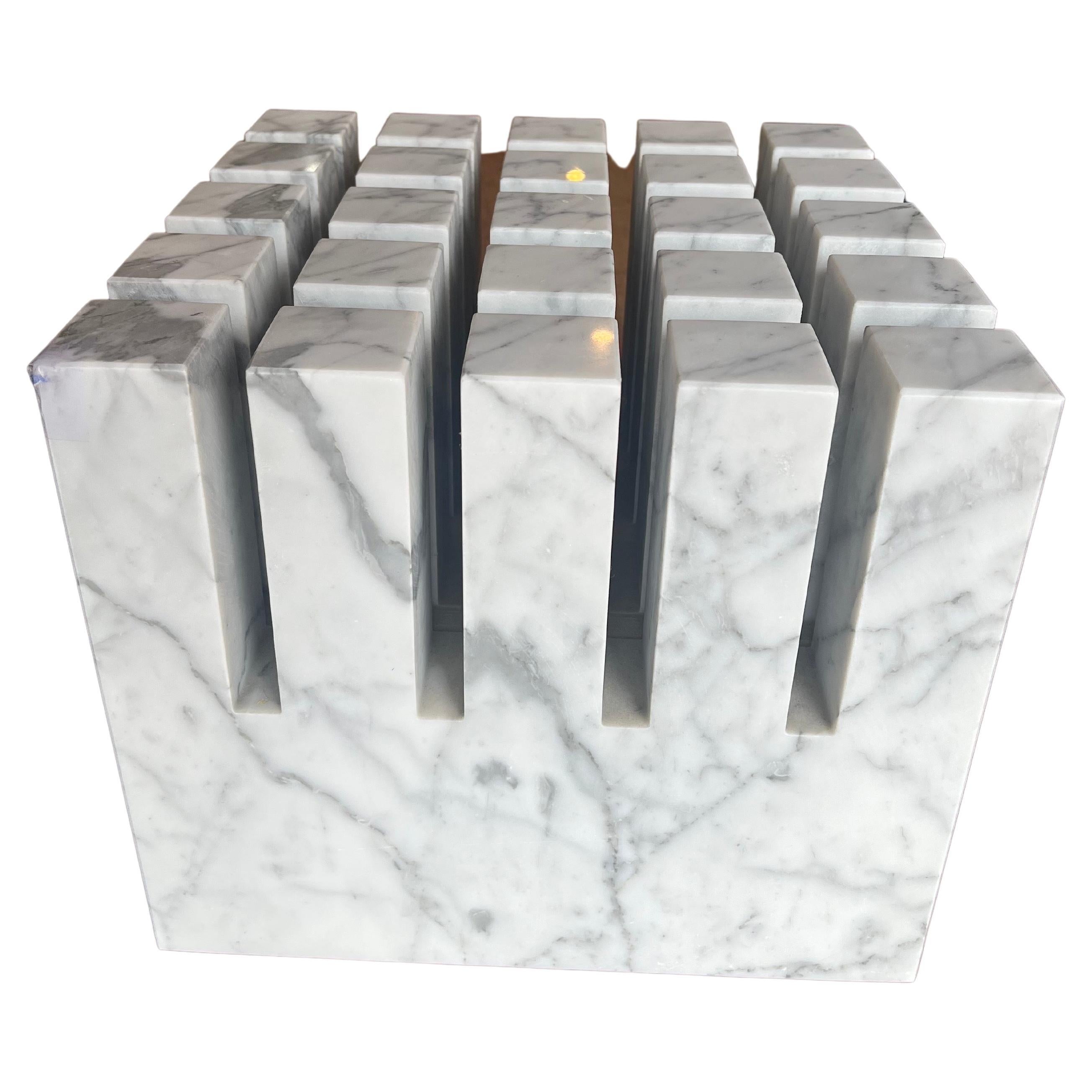 Striking solid Carrara marble coffee table Base designed in 1986 by Phillip Jackson, beautiful design A sculpture by itself can take a rectangular, square, or round glass, a very heavy piece of beautiful grain, incredible construction, and can be