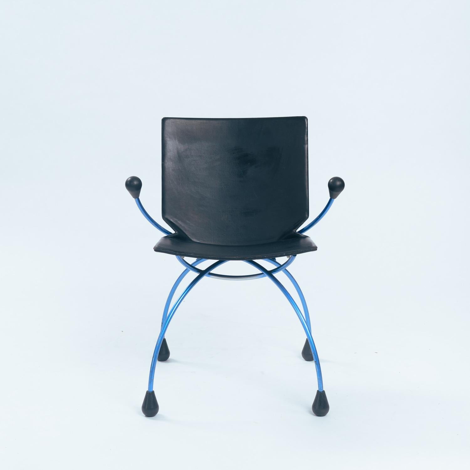 Black Leather Chair on a blue metal base, Designed by Pierre Mazairac & Karel Boonzaaijer for Young International.
80s Post modern Design which remains in good condition with wear consistent with age and use.
comfortable chair can be used as dining