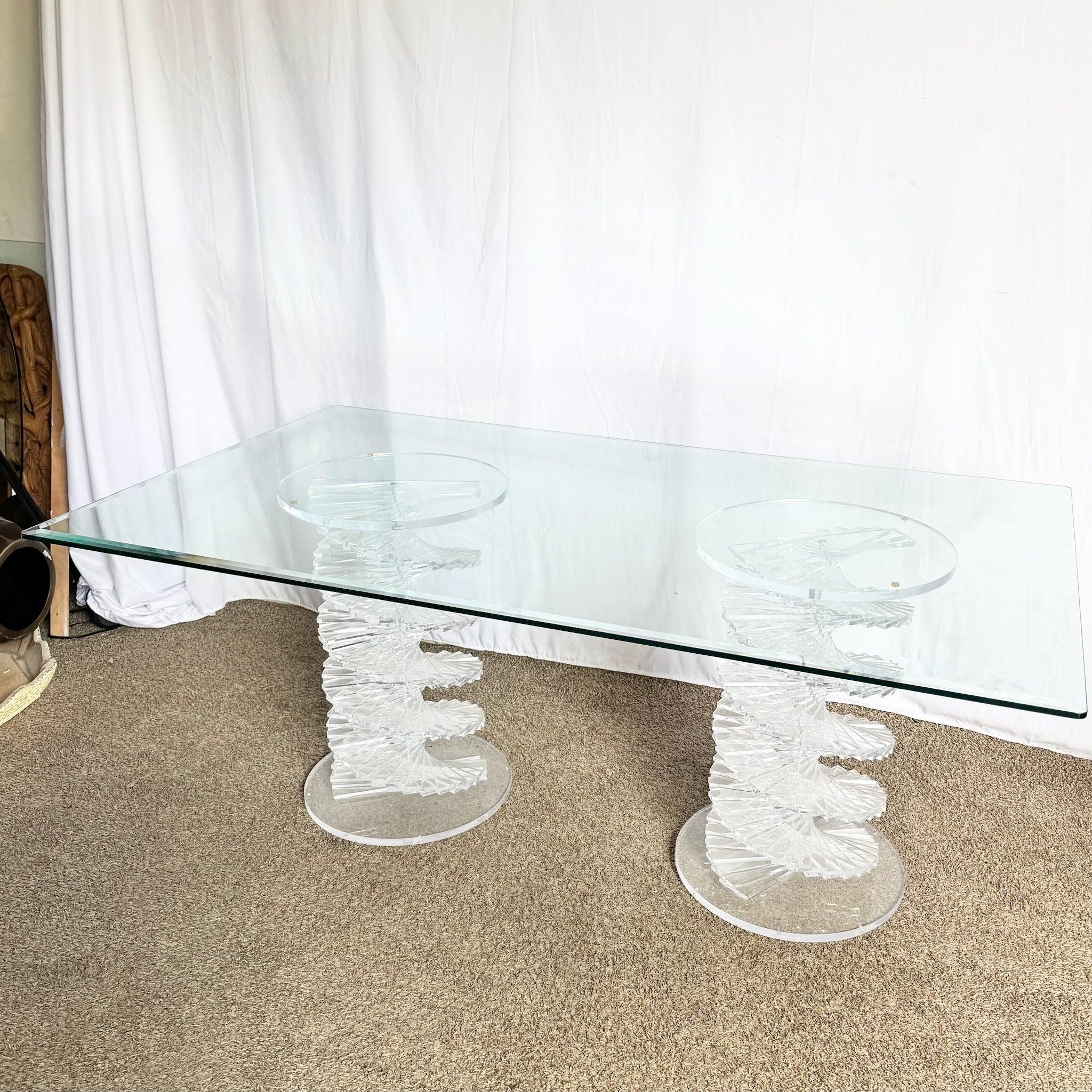 Postmodern Spiral Stacked Lucite Table with twin helix bases and glass top — an elegant sculptural centerpiece blending 1980s glamour and function.
 

 We sell items as acquired, without restoring or repairing. Vintage pieces may have age-related