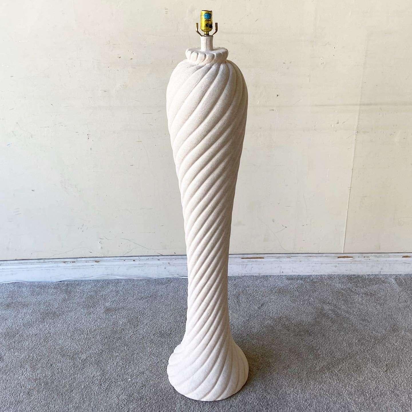 Exceptional vintage postmodern ceramic floor lamp. Features a light pink lavender over off white finish with a spiral swirl sculpted body. 