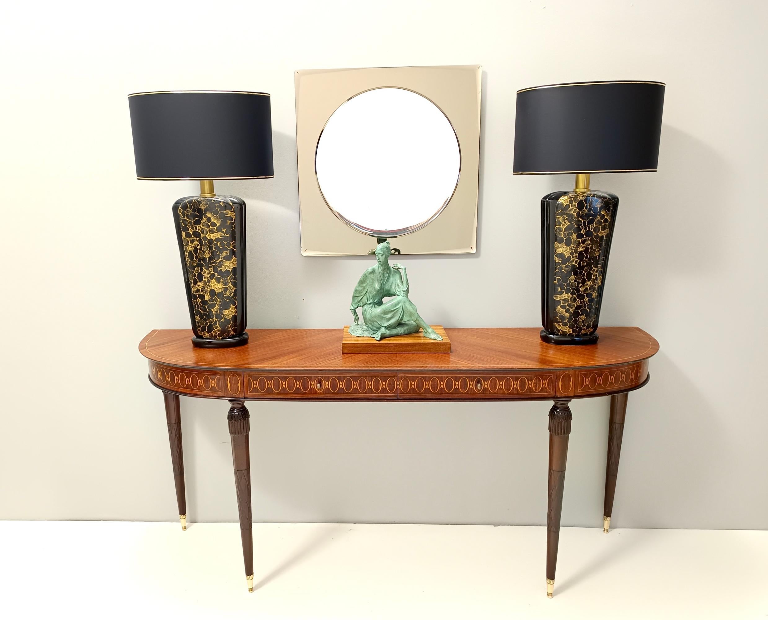 Made in Italy, November 5th 1974. 
This mirror features a beige beveled mirror frame.
The back is stamped with the date of manufacture.
It might show slight traces of use since it's vintage but it can be considered as in very good original