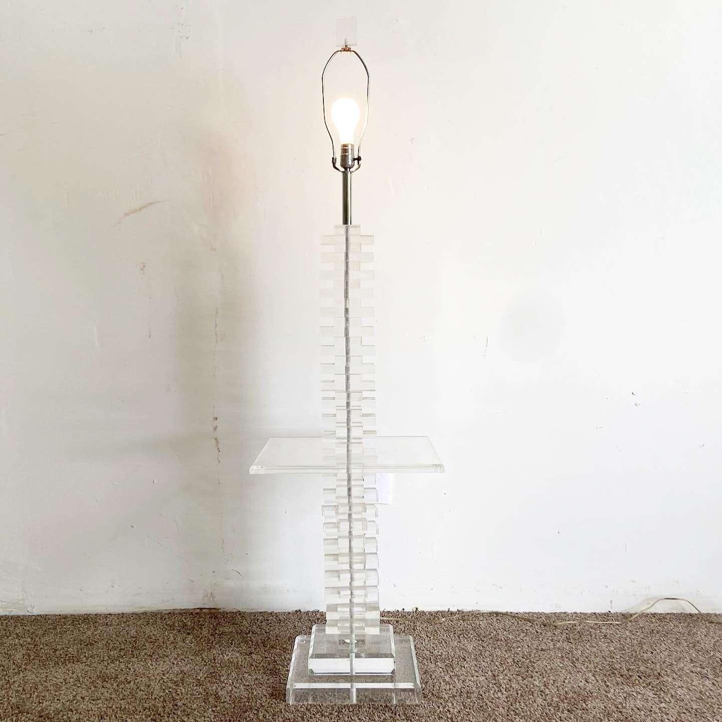 Incredible vintage postmodern floor lamp/side table combo! Features a stacked lucite body.
