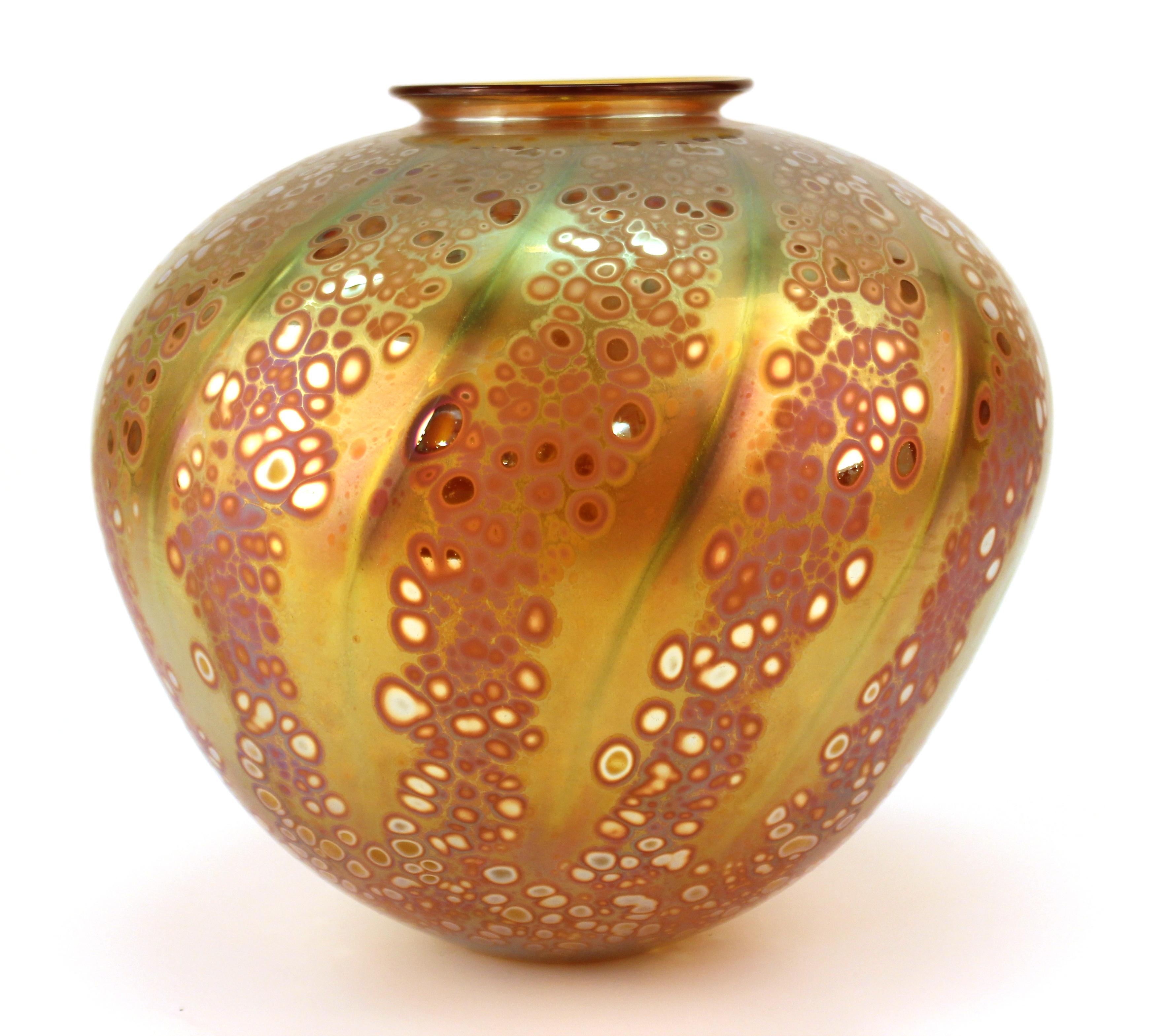 Postmodern studio art glass vase with signature and date on the bottom. The piece has iridescent elements that give it a very distinct shine and luster. Dated from 1993, the vase is in great vintage condition.