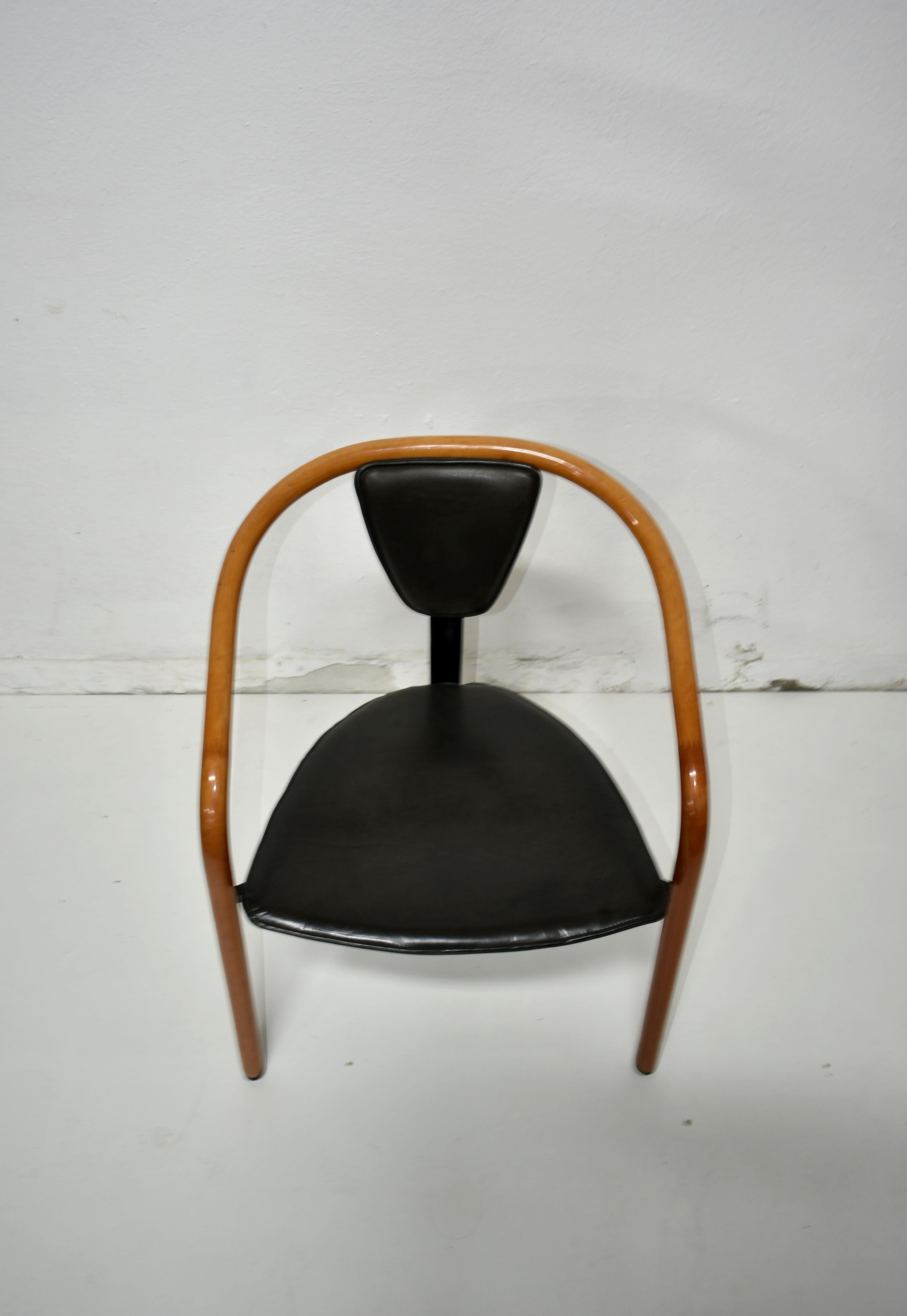 Vintage Postmodern 1980s tripod dining chair ‘Tacchi' by Toshiyuki Kita for AIDEC, Japan.


'Born in Osaka in 1942 Kita’s designs have won international acclaim for both his adherence to sustainable design and his organic, almost faunal forms. As