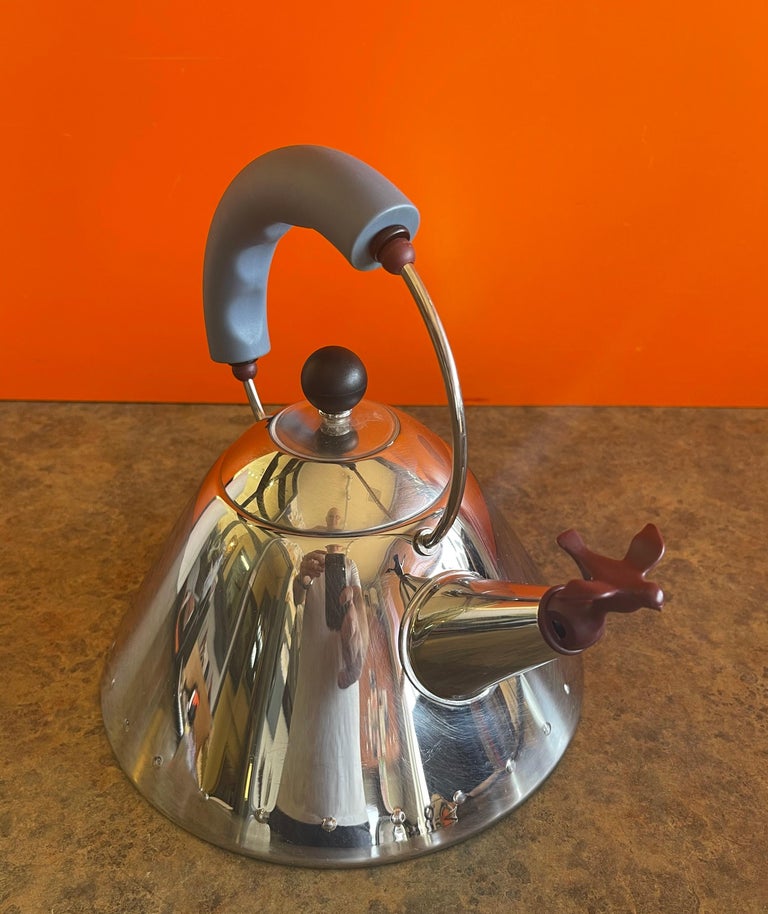 https://a.1stdibscdn.com/postmodern-tea-kettle-with-cream-sugar-by-michael-graves-for-alessi-for-sale-picture-4/f_9366/1628466035116/mobilejpegupload_84A71F871BE645969692FD286A04BF8D_master.jpg?width=768