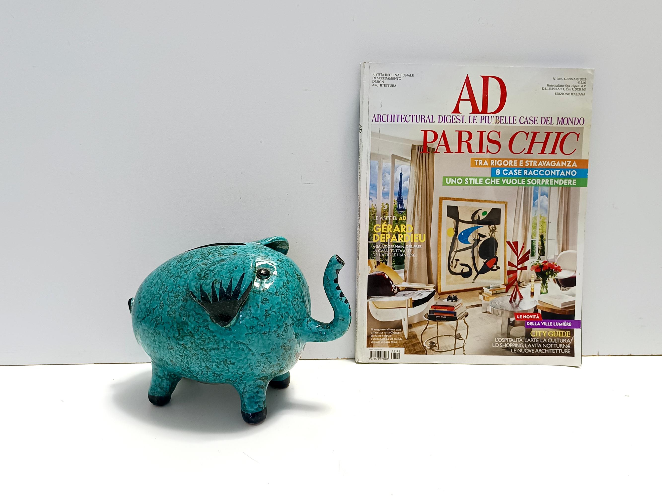 Made in Italy, 1960s - 1970s. 
This is a teal hand -modeled, - glazed, - painted ceramic moneybox by Fanciullacci. 
Its 