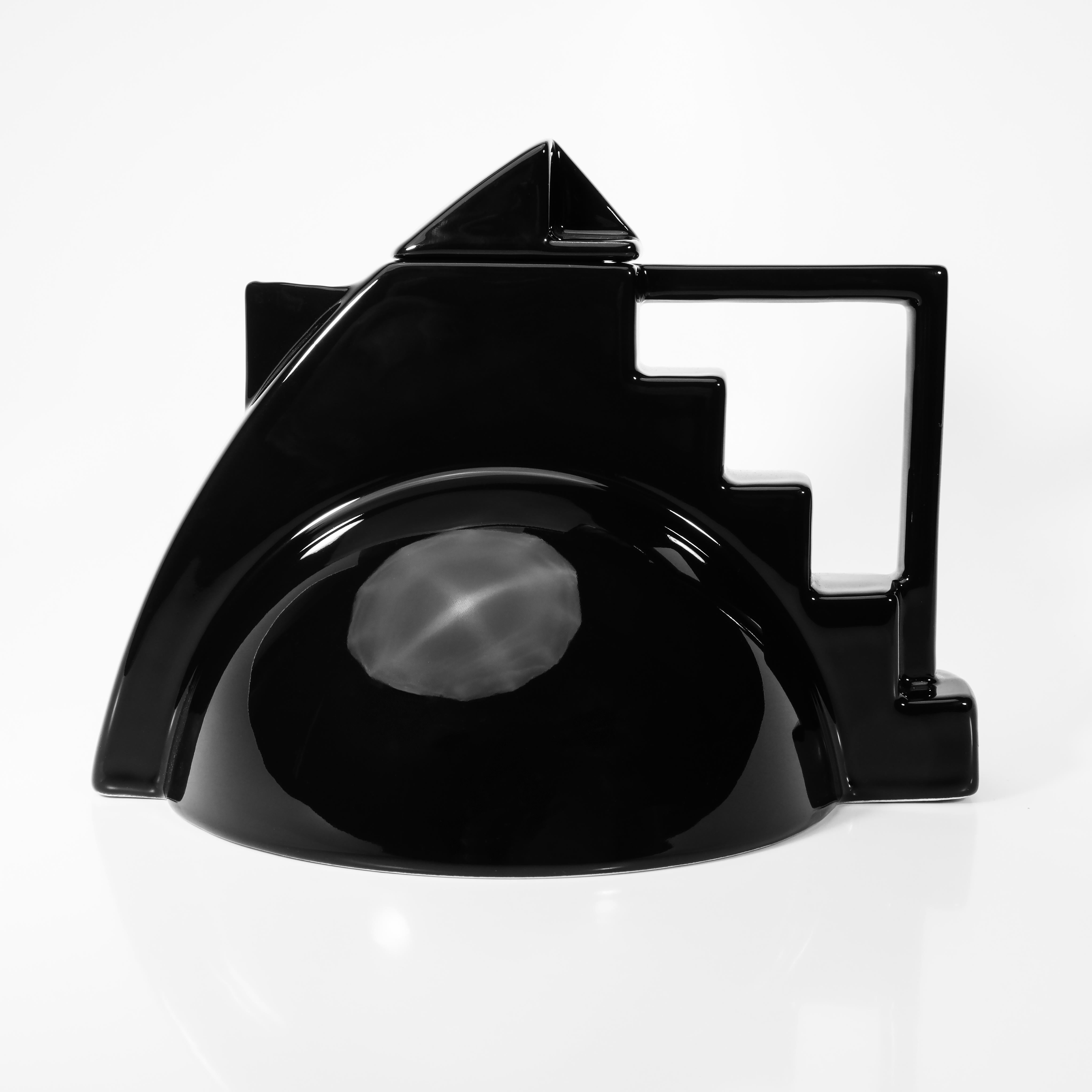 French ceramist Pierre Casenove created this coveted though elusive black Postmodern Memphis-inspired teapot in 1985 for Salins Studio France. This mint-condition teapot is 1980s design at its most iconic: note the Ziggurat profile and the glossy