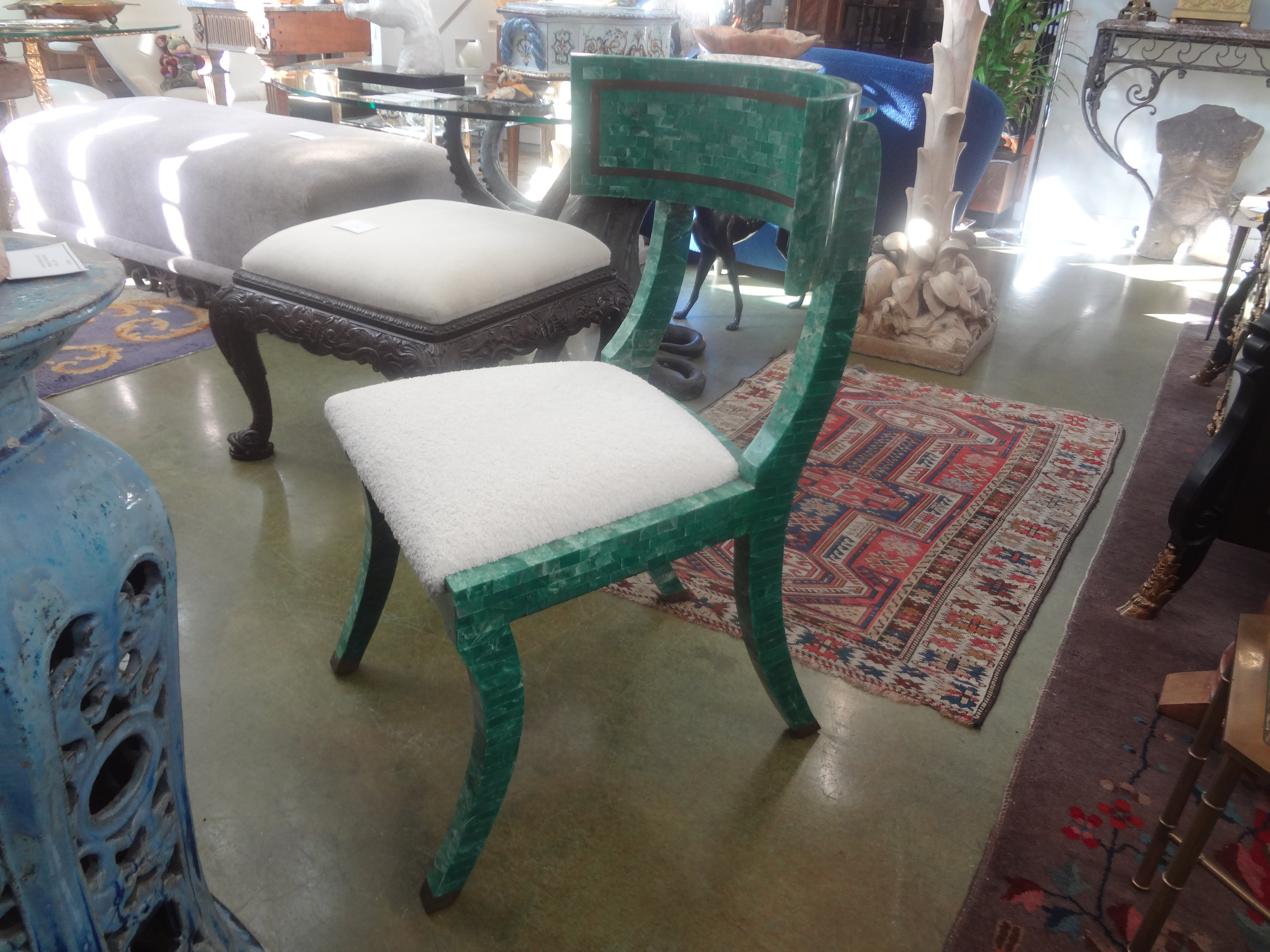 Vintage Maitland Smith Tessellated Stone Klismos Chair.
This unusual Maitland-Smith tessellated stone Klismos chair, side chair, desk chair, office chair or vanity chair is beautifully designed in a gorgeous tessellated green stone with brass trim