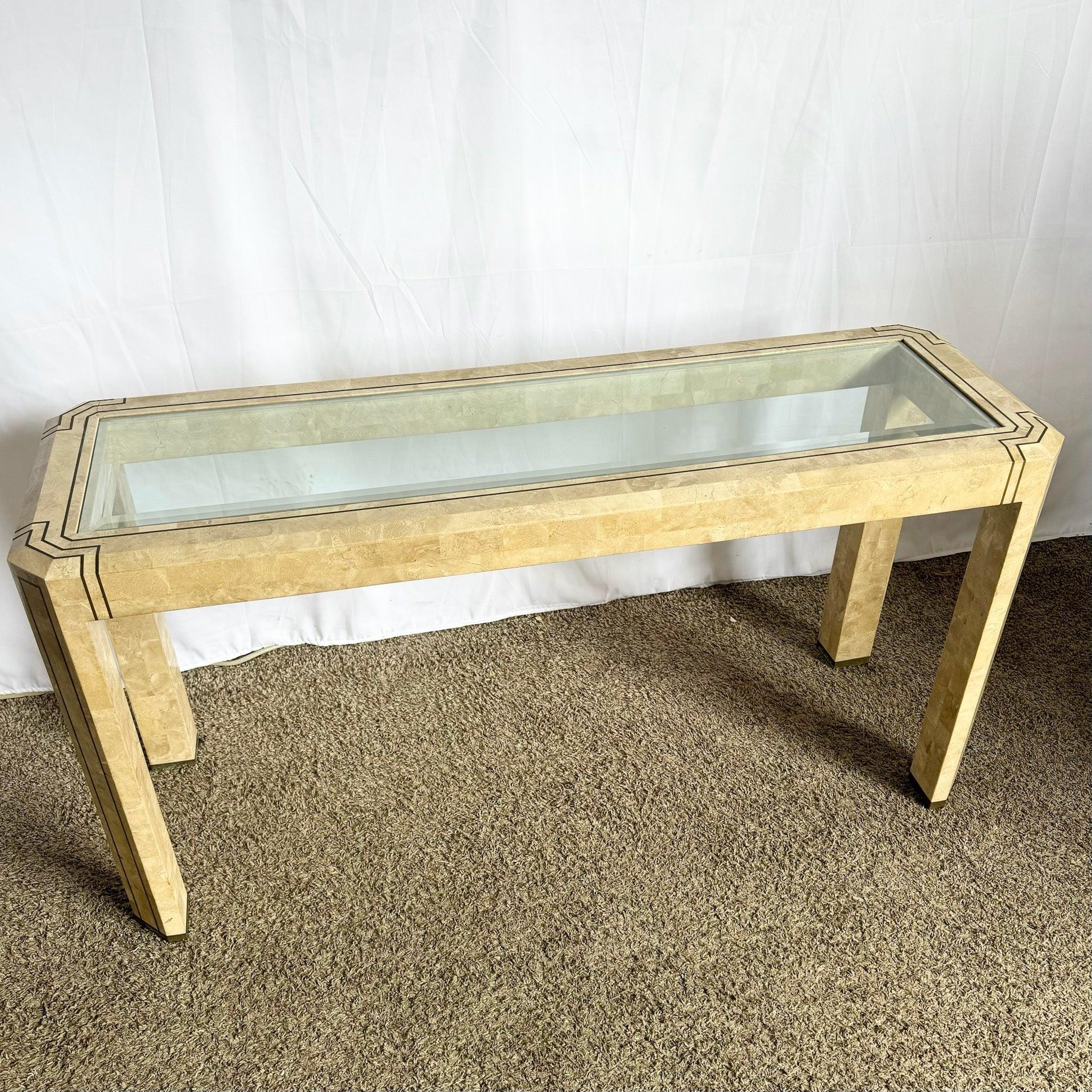 Postmodern Tessellated Stone Console Table with Brass and Glass Inlay, featuring a geometric design and glass top, perfect for modern interiors.
 
 One minor crack on the stone as shown in the photo which does not affect the structural integrity of