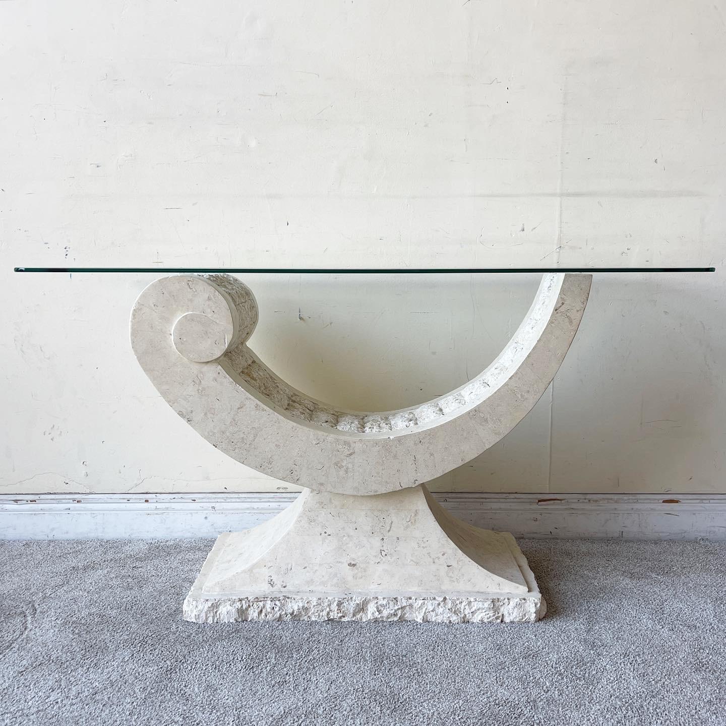 Incredible postmodern tessellated stone glass top console table. Features a sculpted ribbon base with a beveled glass top.
   