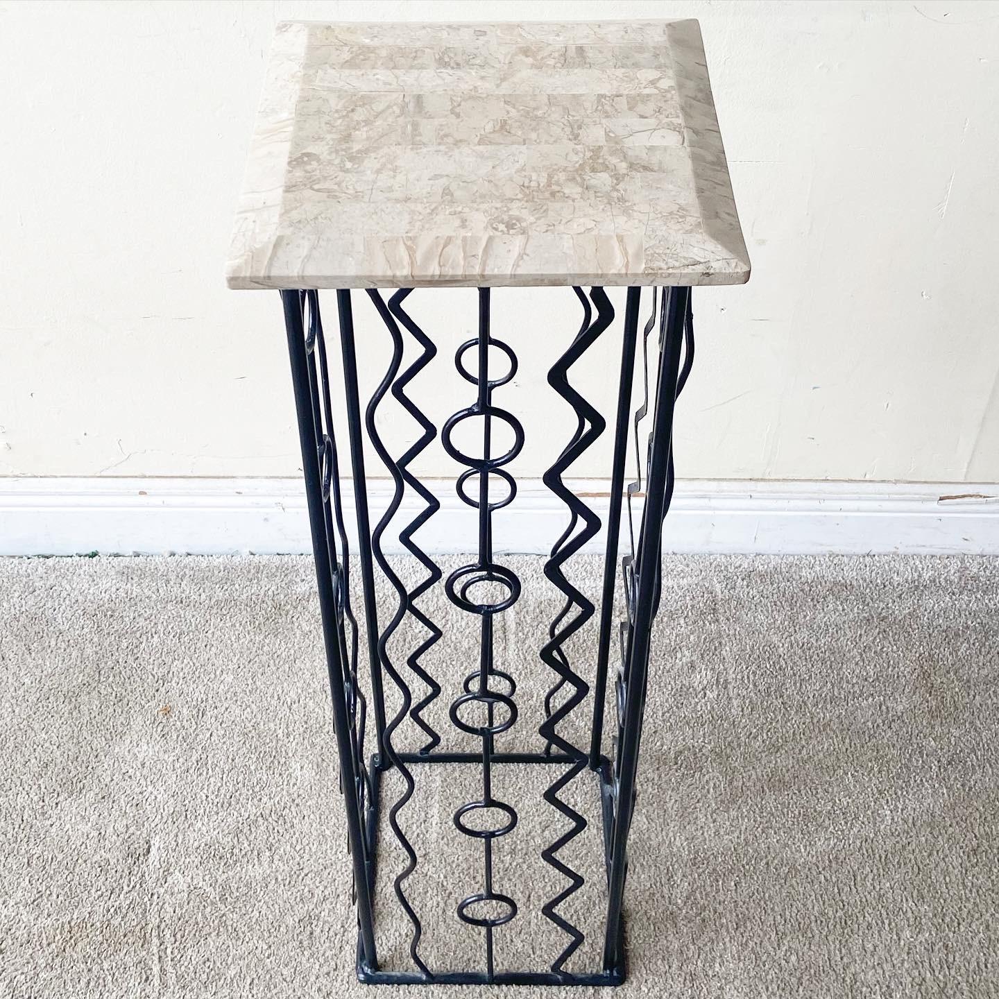 Amazing postmodern iron pedestal. The top is comprised of a polished tessellated stone.