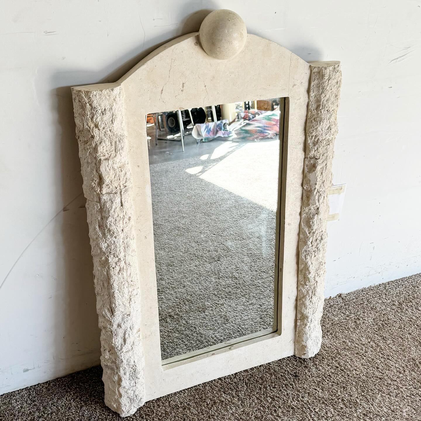 Embrace the inventive spirit of the Postmodern era with this Tessellated Stone Wall Mirror. The mirror features a unique frame made of tessellated stone, arranged in a captivating mosaic of geometric shapes. 
 
 
 
 This intricate design adds both