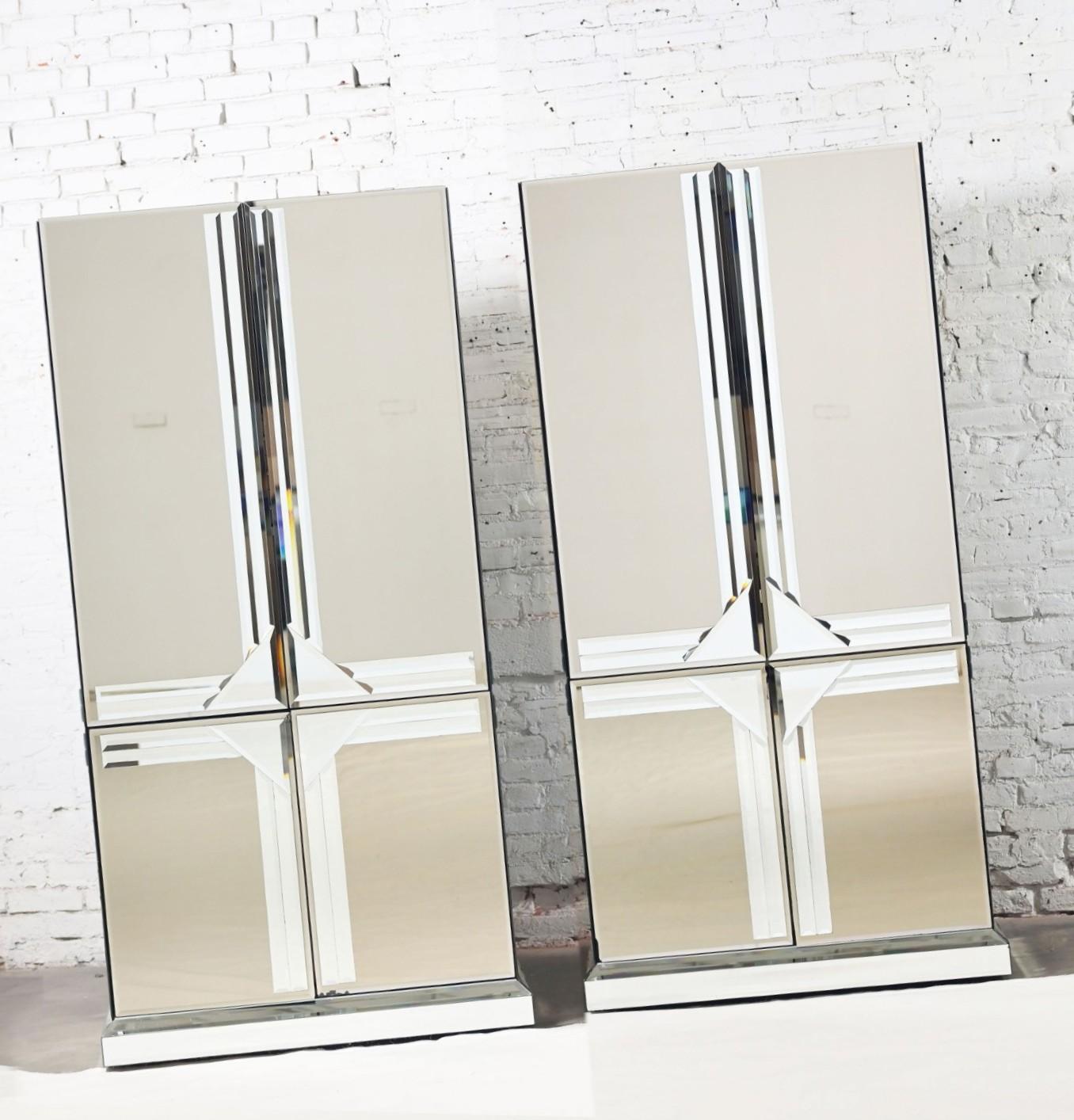 Stunning vintage Postmodern to Art Deco Revival or Hollywood Regency layered mirrored entertainment cabinet & armoire or wardrobe a pair, in the style of Ello Furniture Manufacturing. Beautiful condition, keeping in mind that these are vintage and
