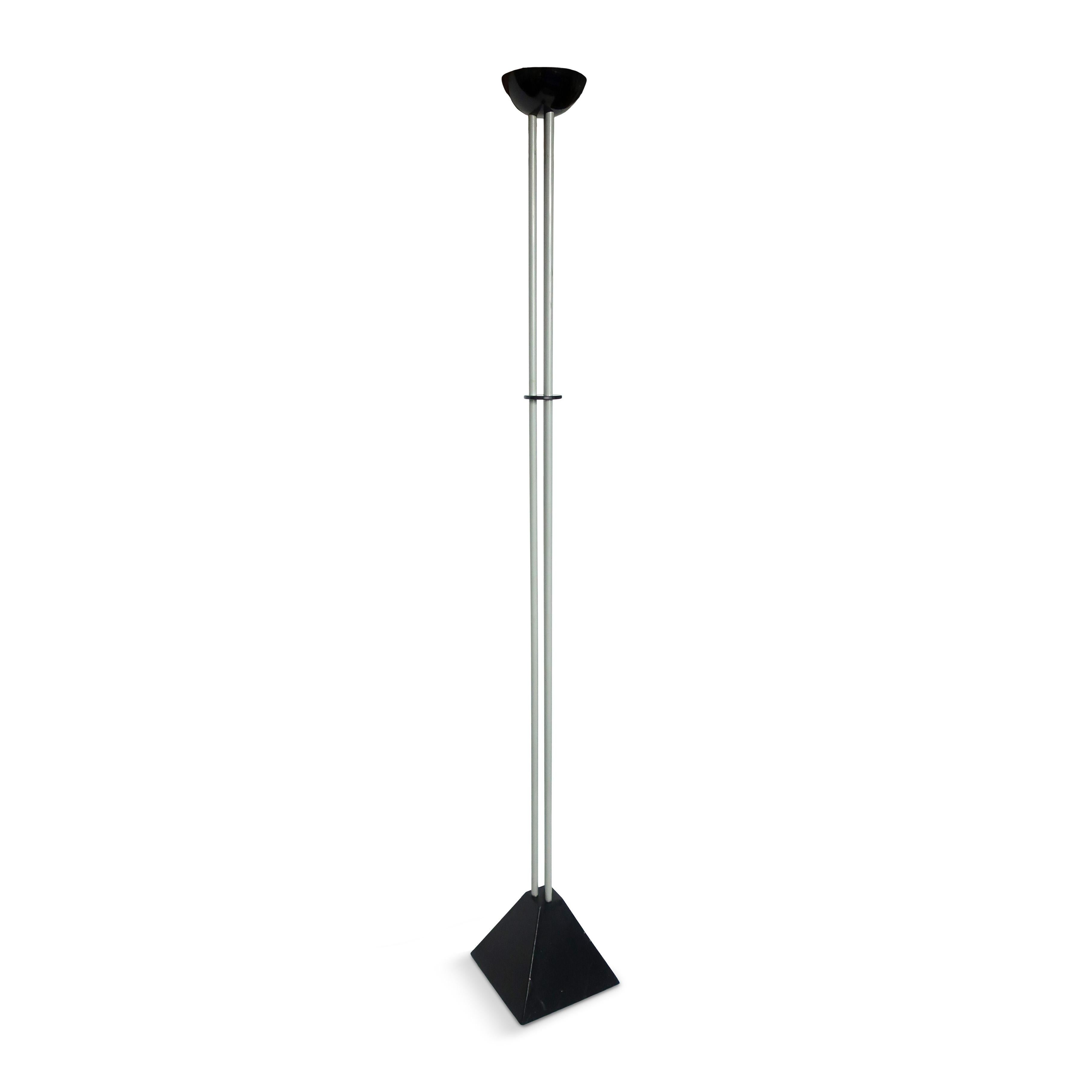 A 1980s postmodern and minimalist black and gray torchiere floor lamp designed by Ron Rezek, the West Coast American lighting kingpin known for his many iconic designs produced by his eponymous company and Italian heavyweight Artemide. This