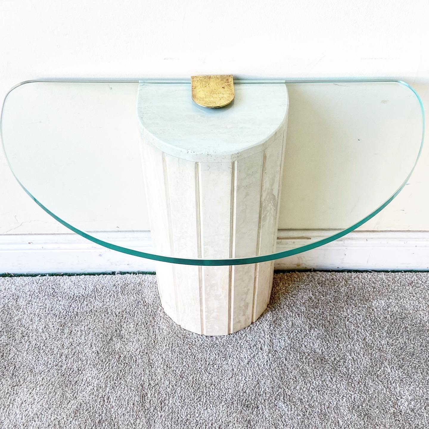 Elegant Demi lune glass top accent table with smooth travertine base connected by a metal rod and hidden with a piece of brass.

Additional information:
Material: Brass, Glass, Marble
Color: Beige, Gold, Tan
Style: Italian, Postmodern
Time Period: