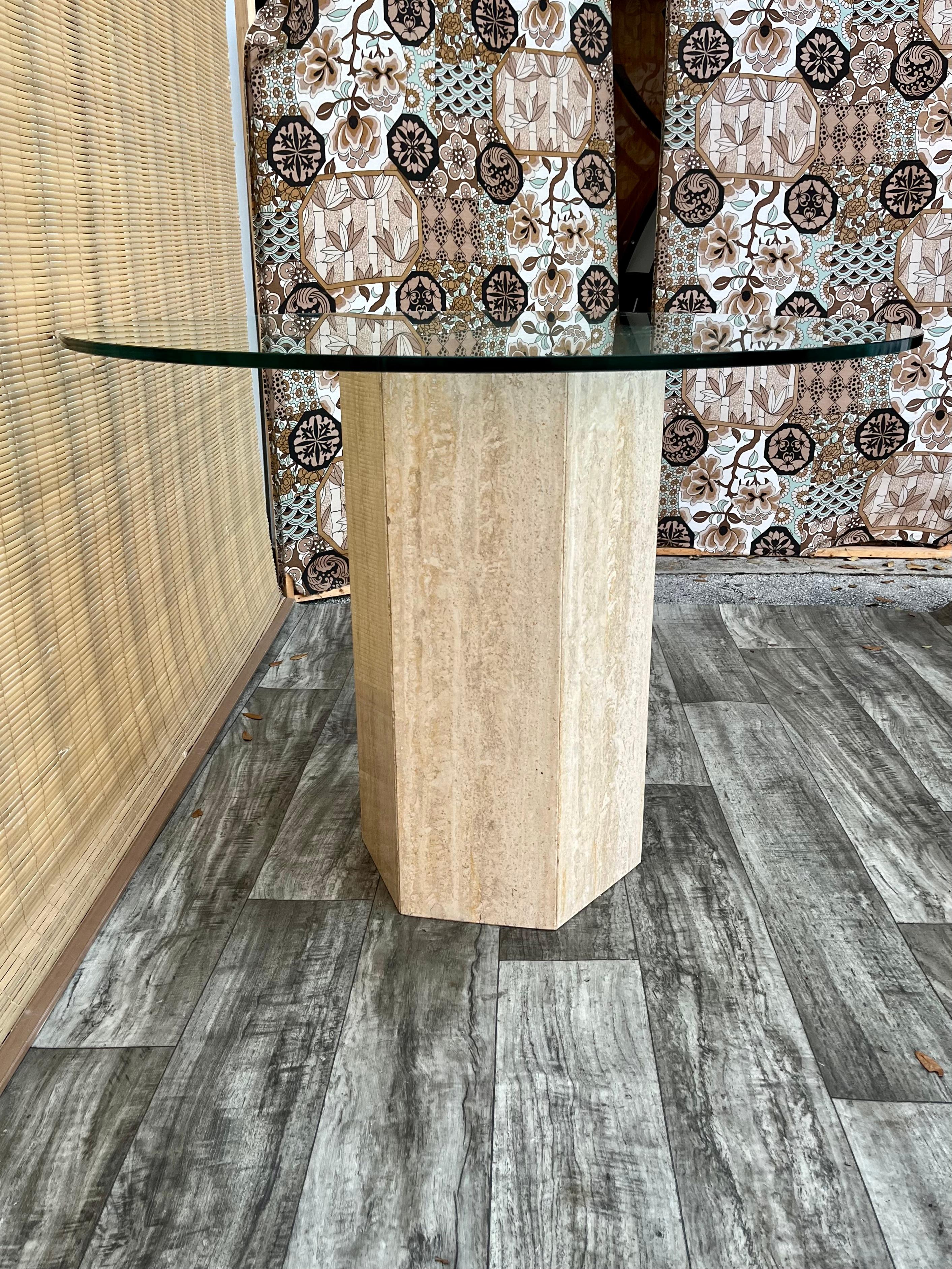 Postmodern Travertine Pedestal Base Glass-Top Center/ Diner Table. Circa 1970s  In Good Condition For Sale In Miami, FL