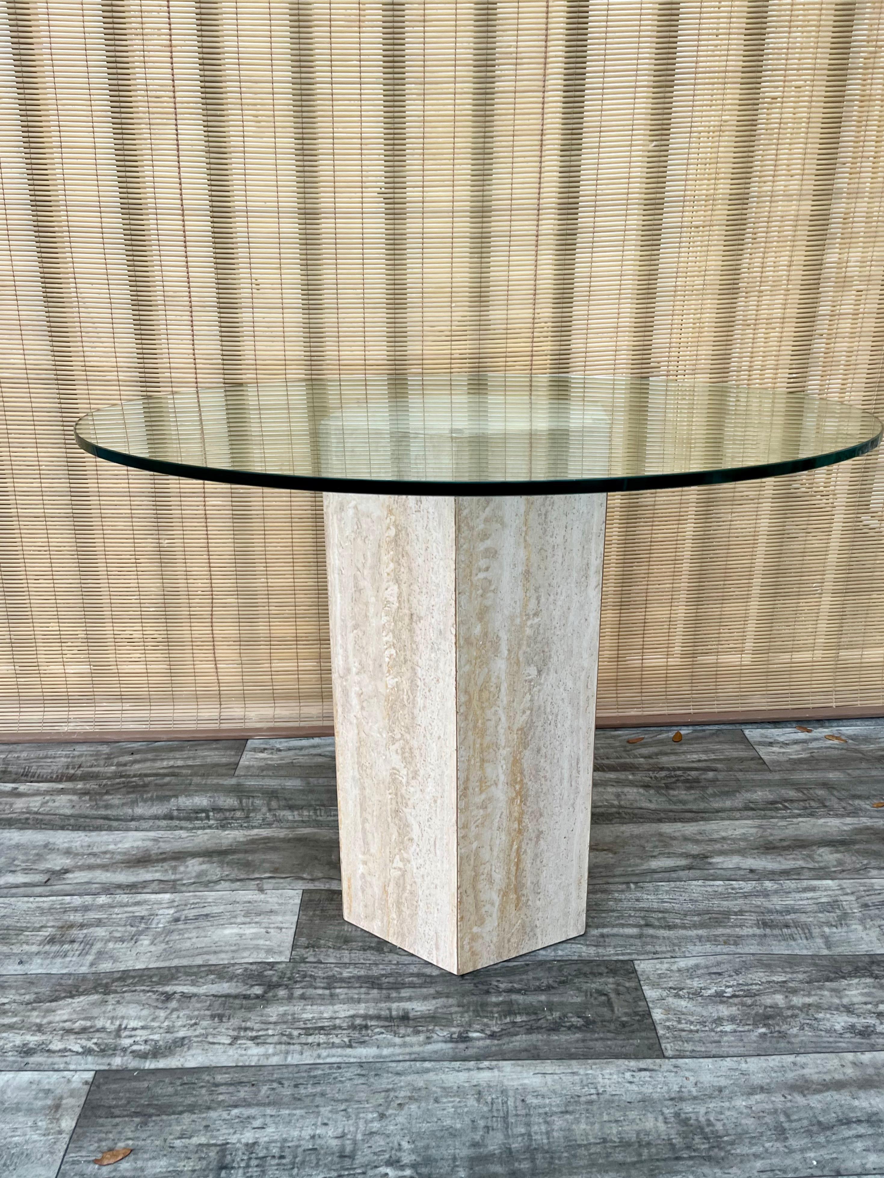 Late 20th Century Postmodern Travertine Pedestal Base Glass-Top Center/ Diner Table. Circa 1970s  For Sale