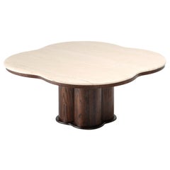 Postmodern travertine shamrock coffee table in the style of Jean Royère