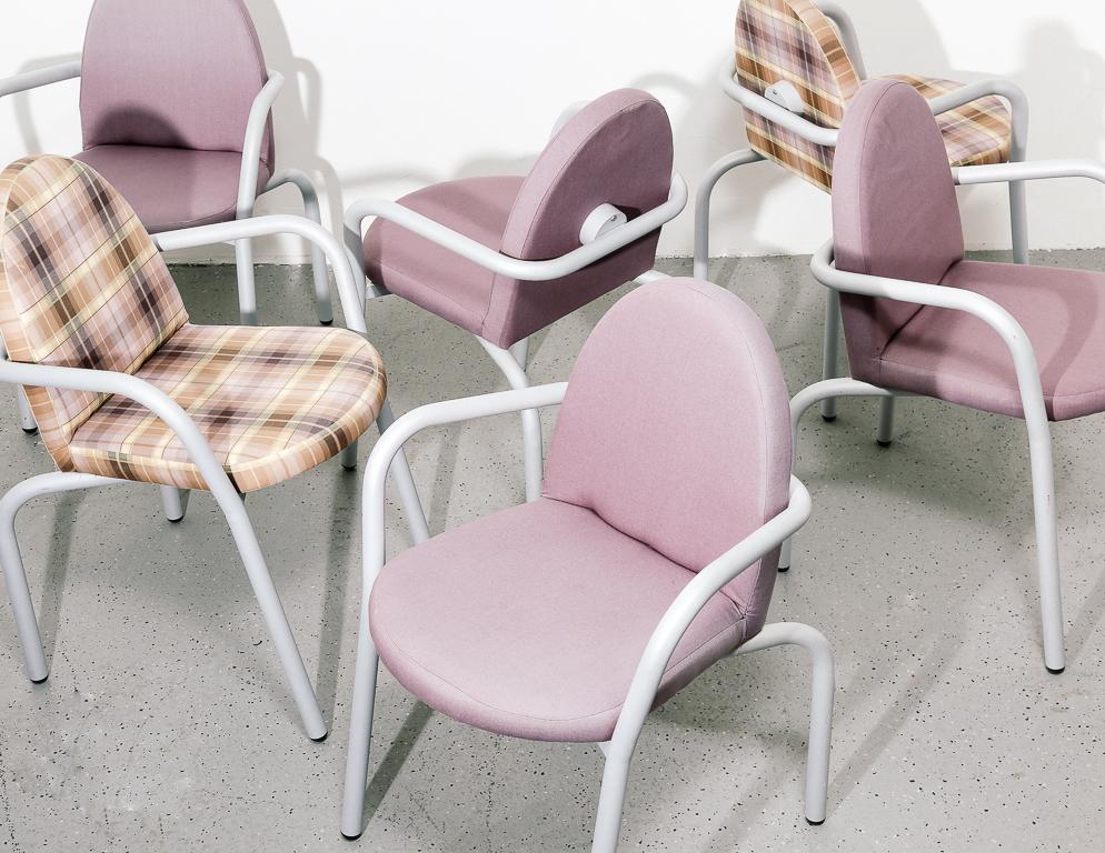 Set of 6 Postmodern armchairs. Thick tubular frames and upholstered seats and backs. 4 in lavender, 2 in plaid.

Measure: 19
