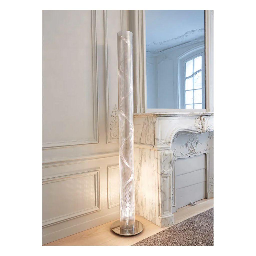 In this listing you will find a sleek Postmodern/Contemporary floor lamp model 