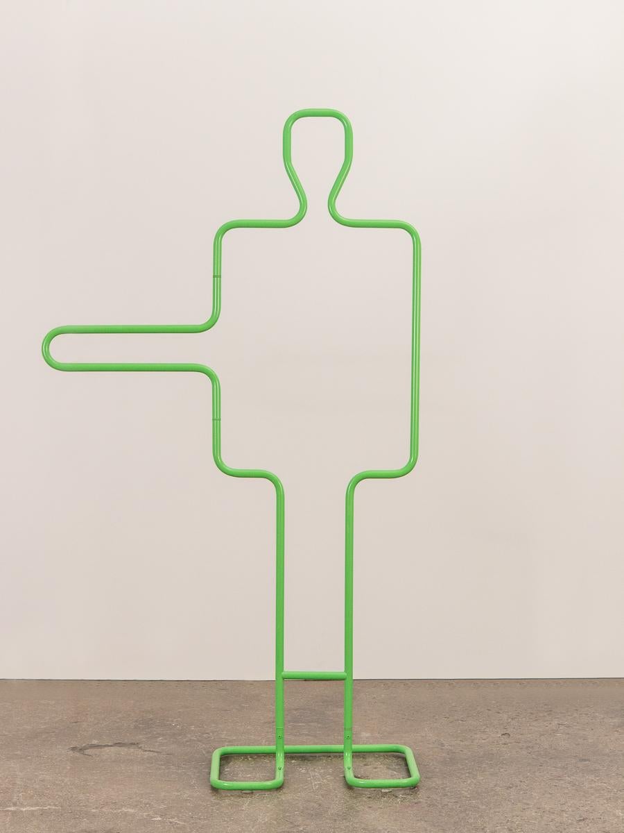 Fun valet stand by anonymous maker. Bright and eye-catching electric green enamel to its metal tubular surface. Life-sized, it would make a wonderful prop or statement piece. In good shape, 1980s.

Measure: 58” tall.