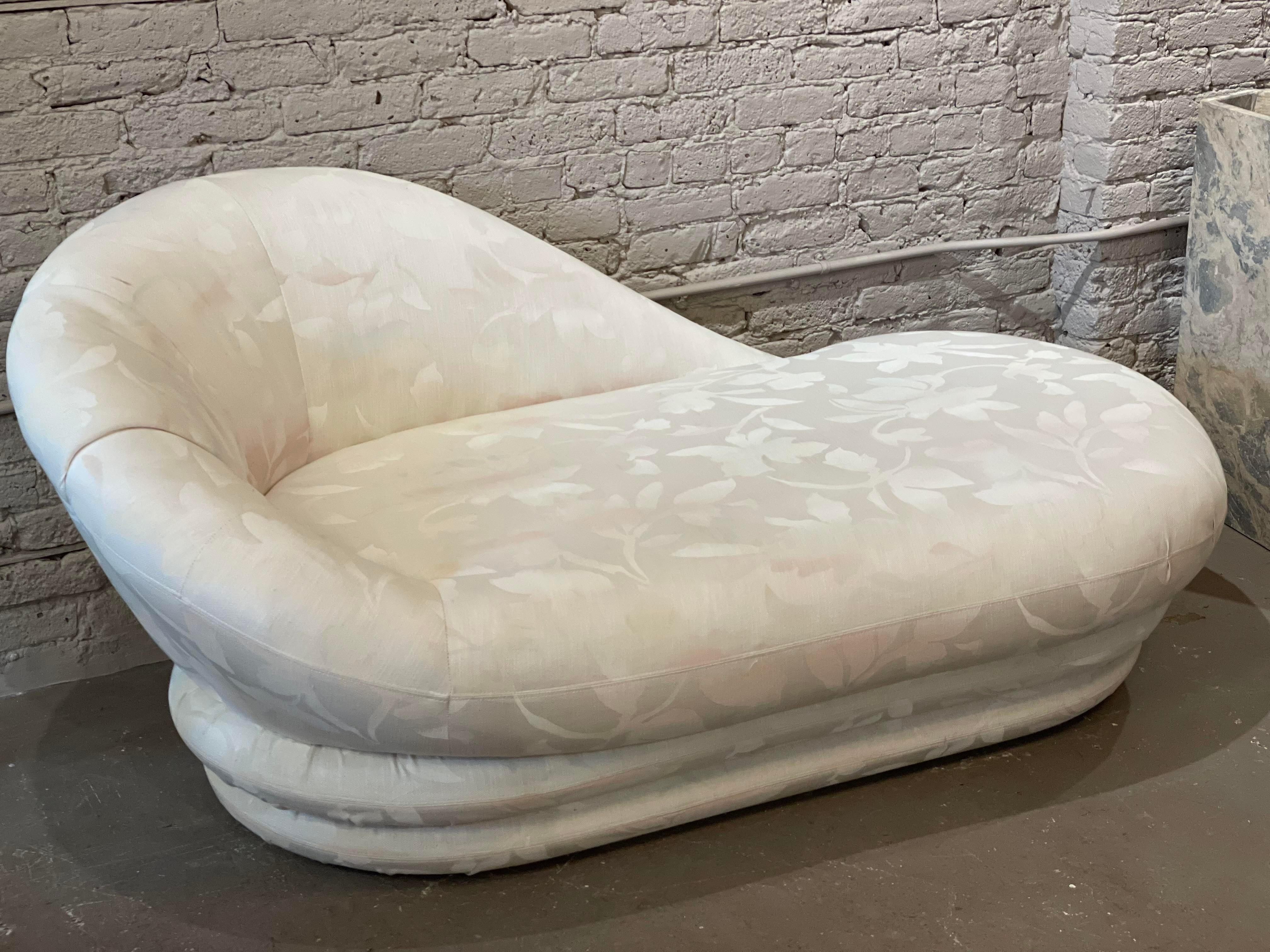 Absolutely adorable and comfortable. The perfect size for a living room or bedroom - the dramatic asymmetrical curved back adds great back support and desired comfort. Use as is or reupholster.