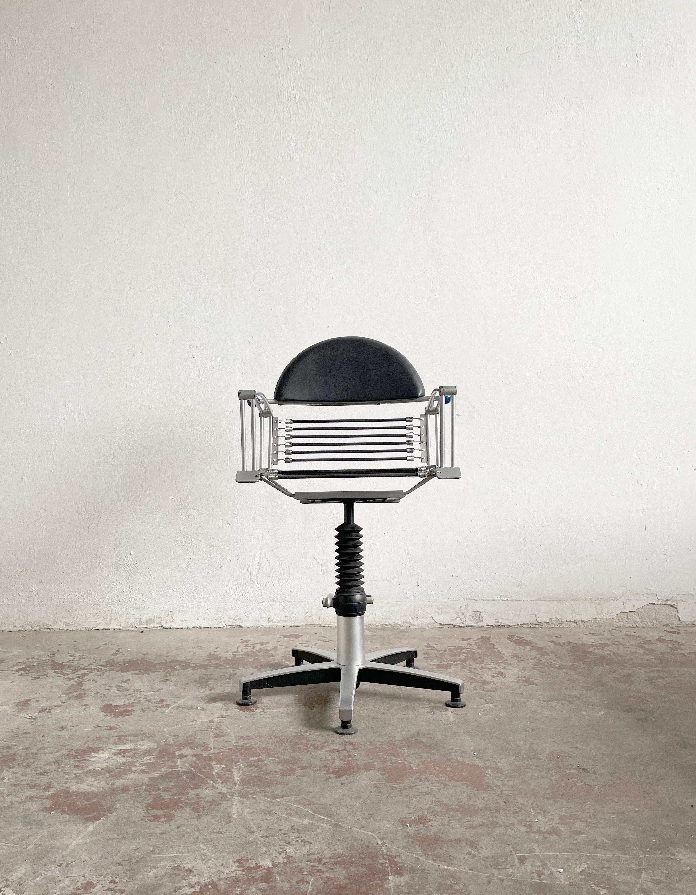 Rare 1980s Welonda swivel chair the hair studio produced by German Company Wella
Designed as a Hair-salon chair, adjustable height, swivel mechanism

Postmodern design

Unique seat made of steel wire coated in black fabric

The height of the