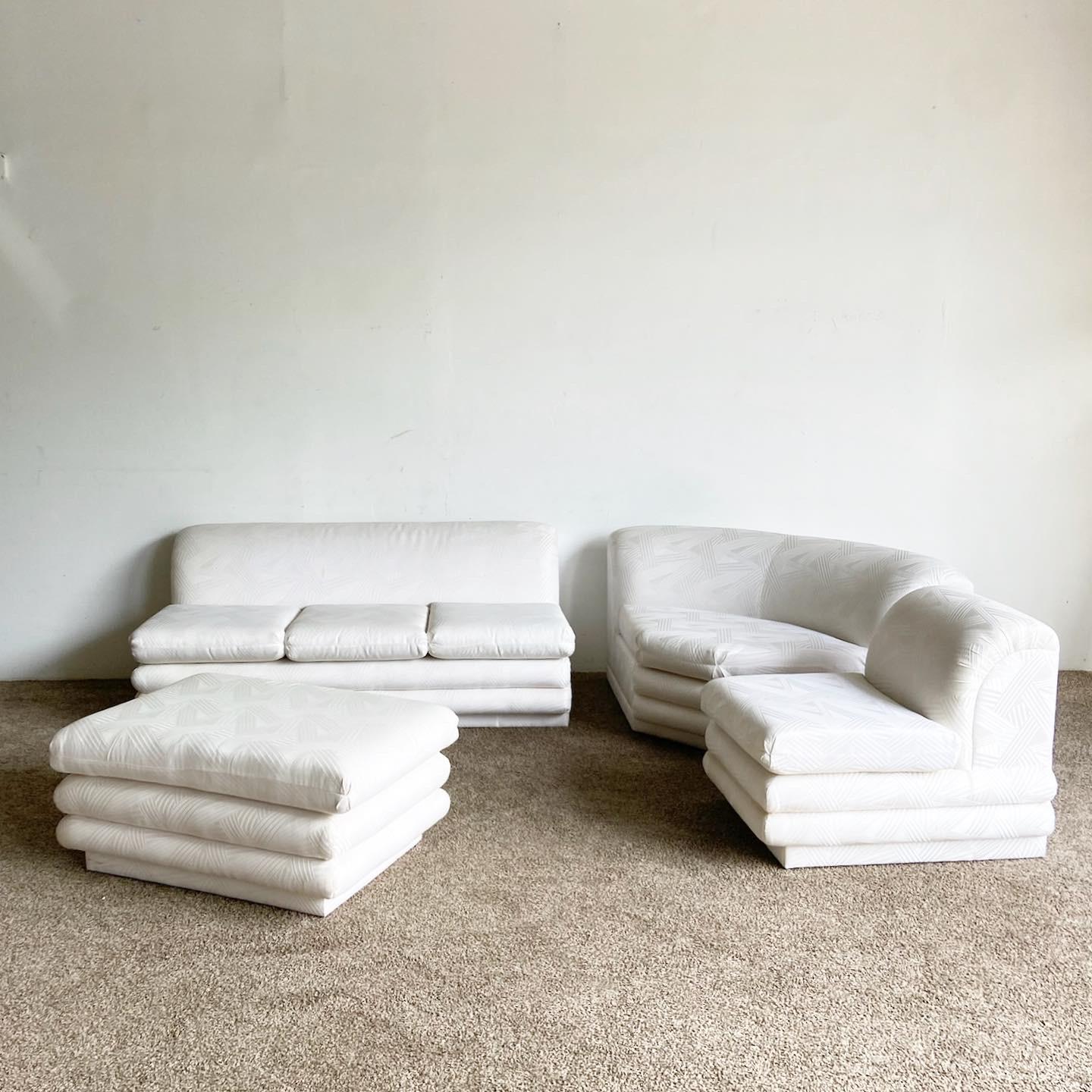Exceptional 4 piece vintage postmodern sectional sofa. Features a white fabric throughout the sofa. ??

Foot rest measures 41”W, 29”D, 18.5”H
?Long section measures 70”W, 37.5”D?
Curved section measures 68”W, 42.5”D?
Small section measures 24”W.