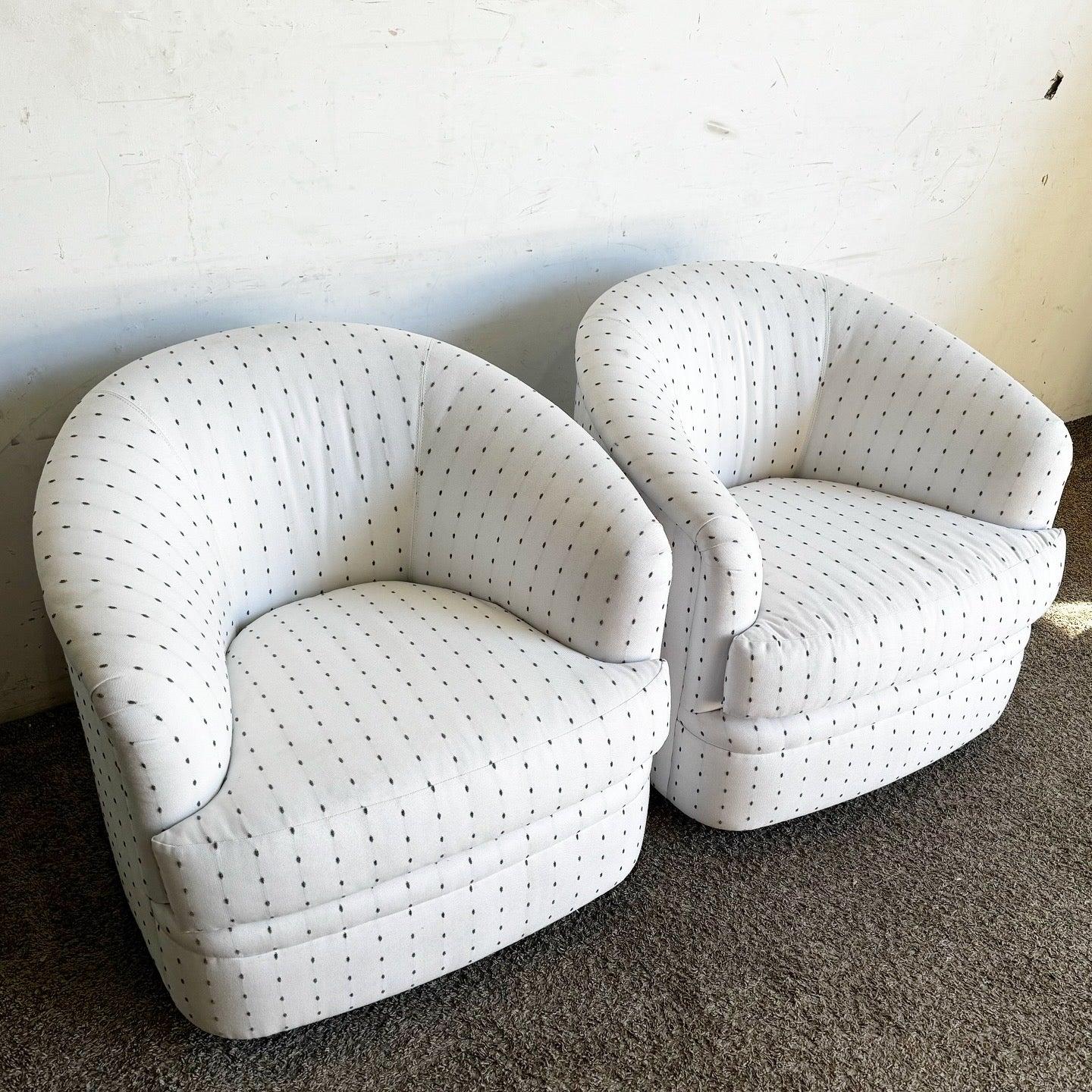 Postmodern White and Gray Swivel Chairs by Carter with chic gray-dotted fabric and barrel-style design. Versatile for lounges and offices.
 
 Some marks to the fabric as shown in the photos.
 
 We sell items as acquired, without restoring or