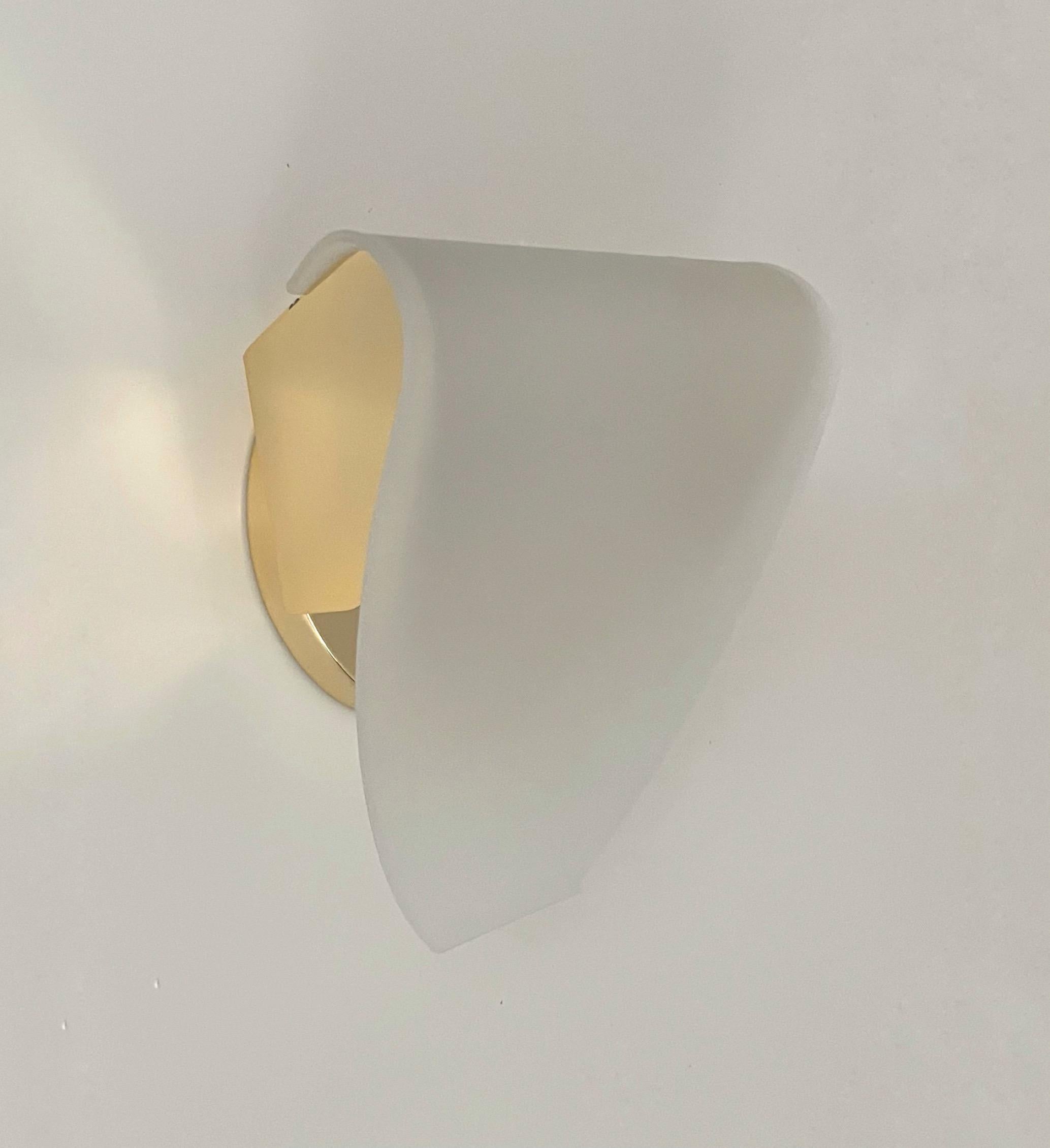 Pretty Postmodern Spanish and unique Set of Four Gold metal White glass Wall Sconces by Blauet. Model: Maria 210 Gold/White. These Wall Lights were made in Barcelona (Spain) by Blauet during 1990s.
They have never been used, the condition is