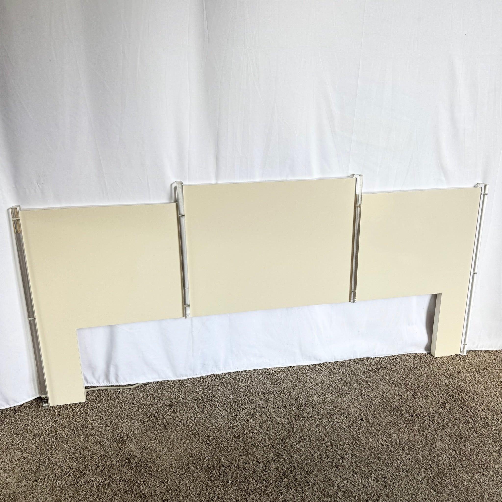 Elevate your bedroom with this Postmodern White Lucite Headboard—where 1980s design meets modern elegance.
 
 Minor wear tot he edges and lucite back as shown in the photos. 
 
 We sell items as acquired, without restoring or repairing. Vintage