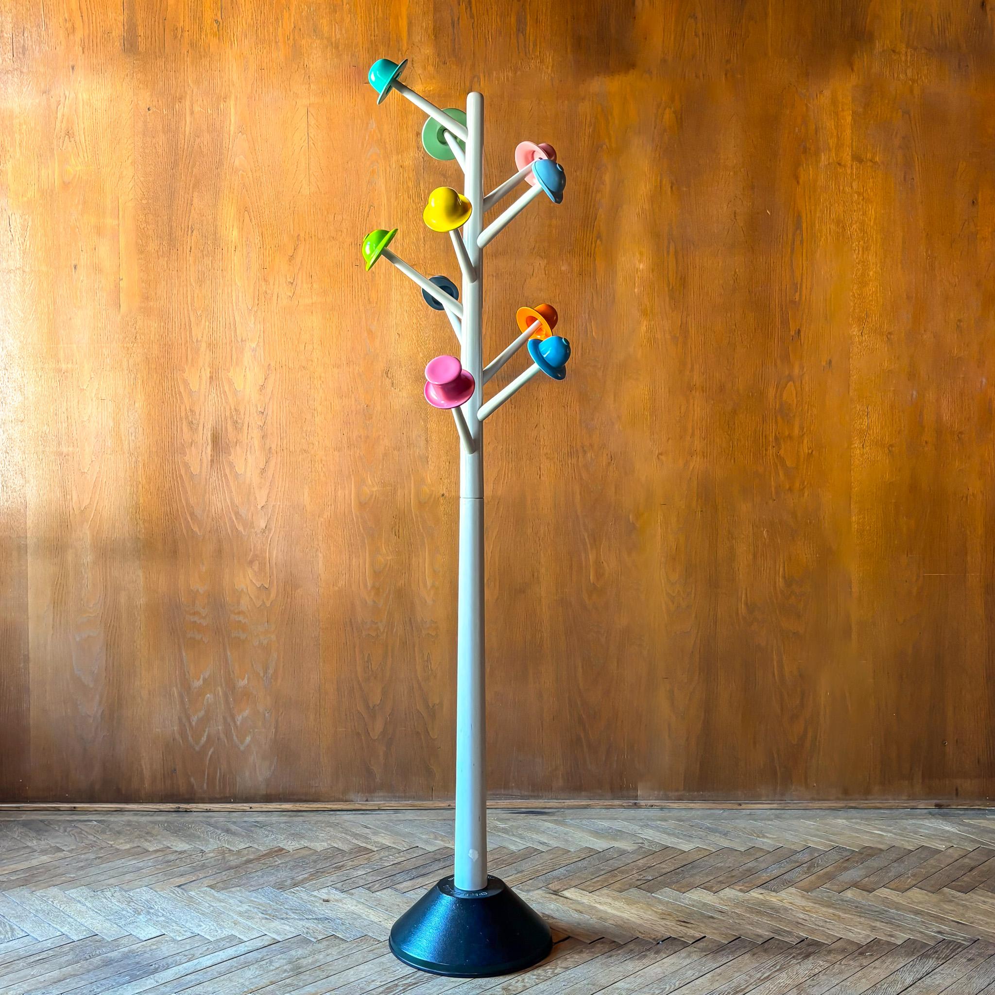 Postmodern White Metal Coatrack with Multi Colored Hooks by Ugo Nespolo.

Funny colourful standing coat rack 