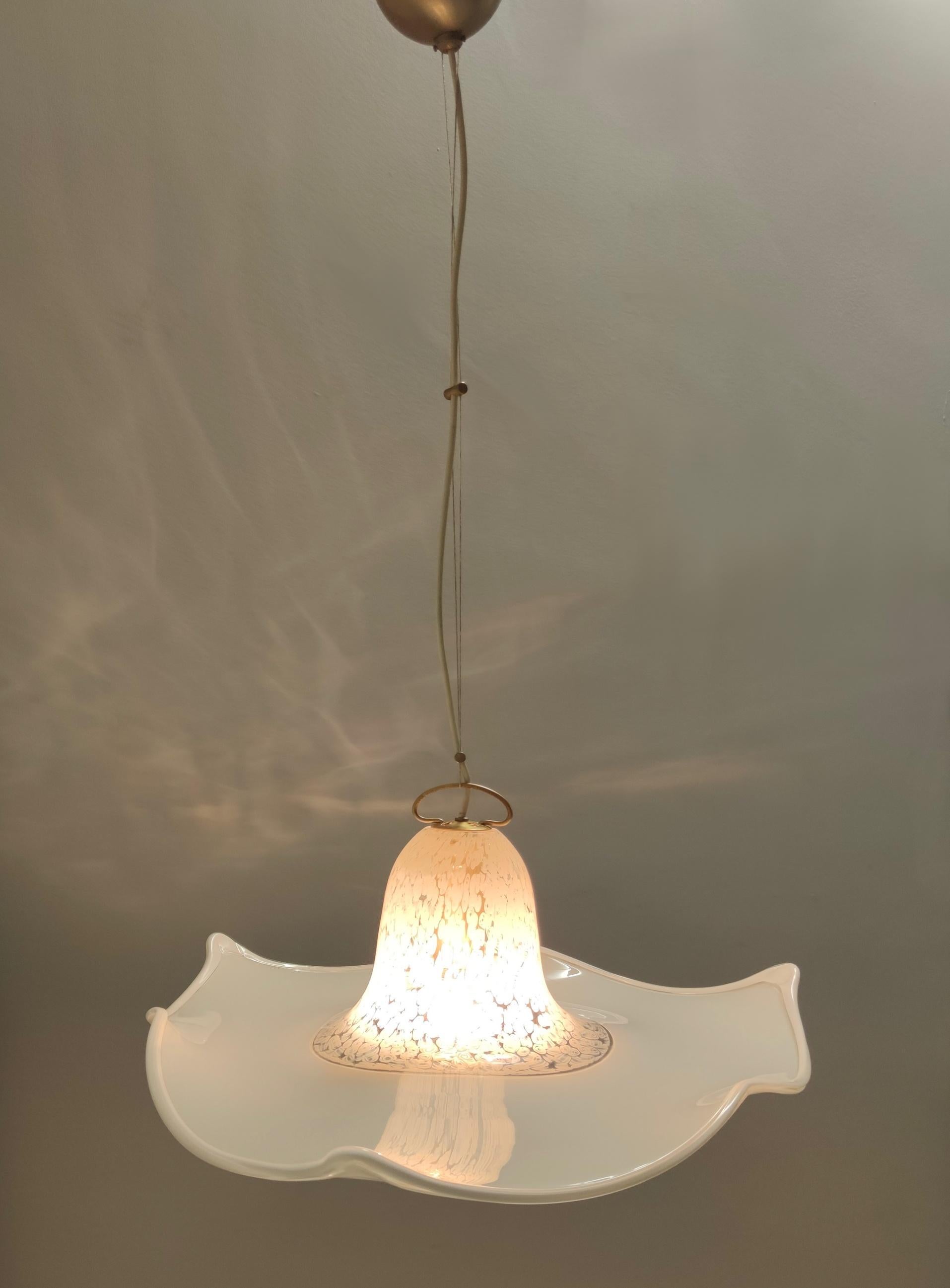 Made in Italy, 1980s. 
This pendant features a white Murano glass lampshade.
It is marked.
This pendant is a vintage piece, therefore it might show slight traces of use, but it can be considered as in excellent original condition and ready to give