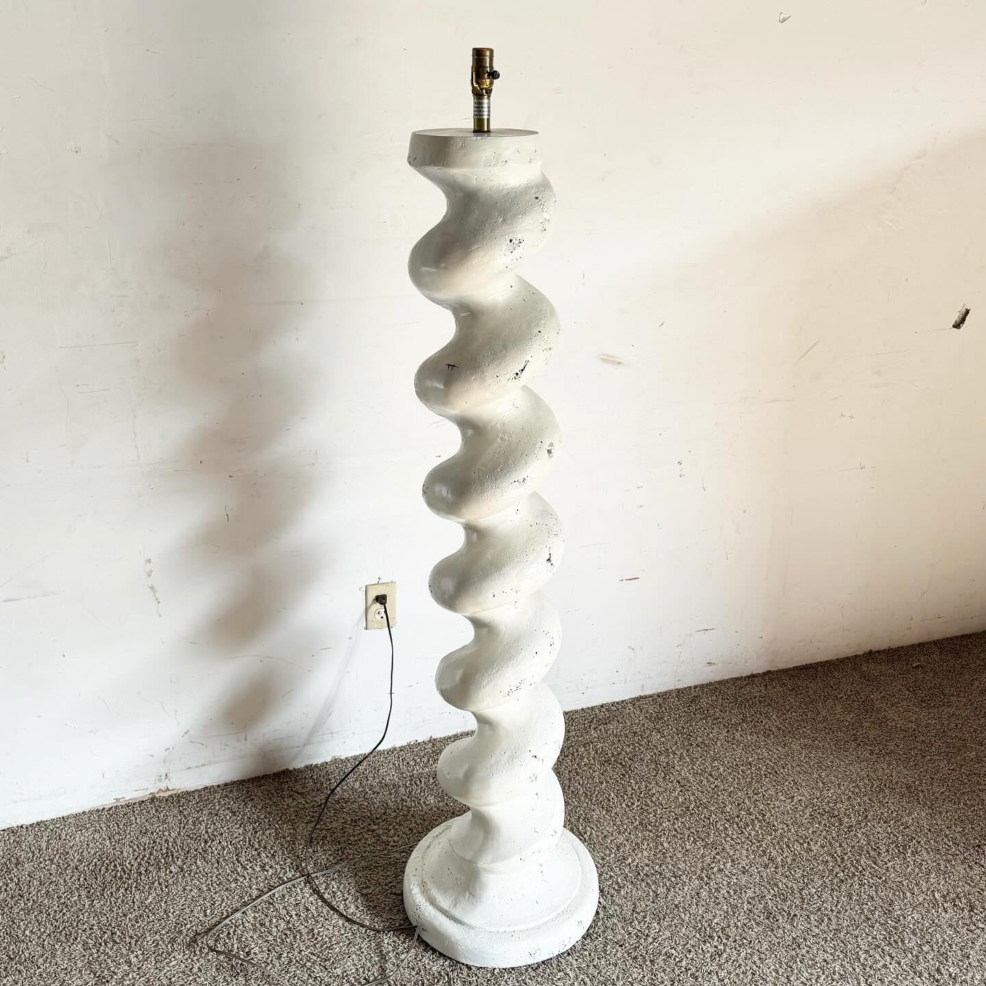 Discover the Postmodern White Plaster Spiral Floor Lamp by Michael Taylor, a fusion of art and function. This floor lamp's unique spiral design, crafted in white plaster, brings a sculptural and dynamic presence to any space. Its smooth lines and