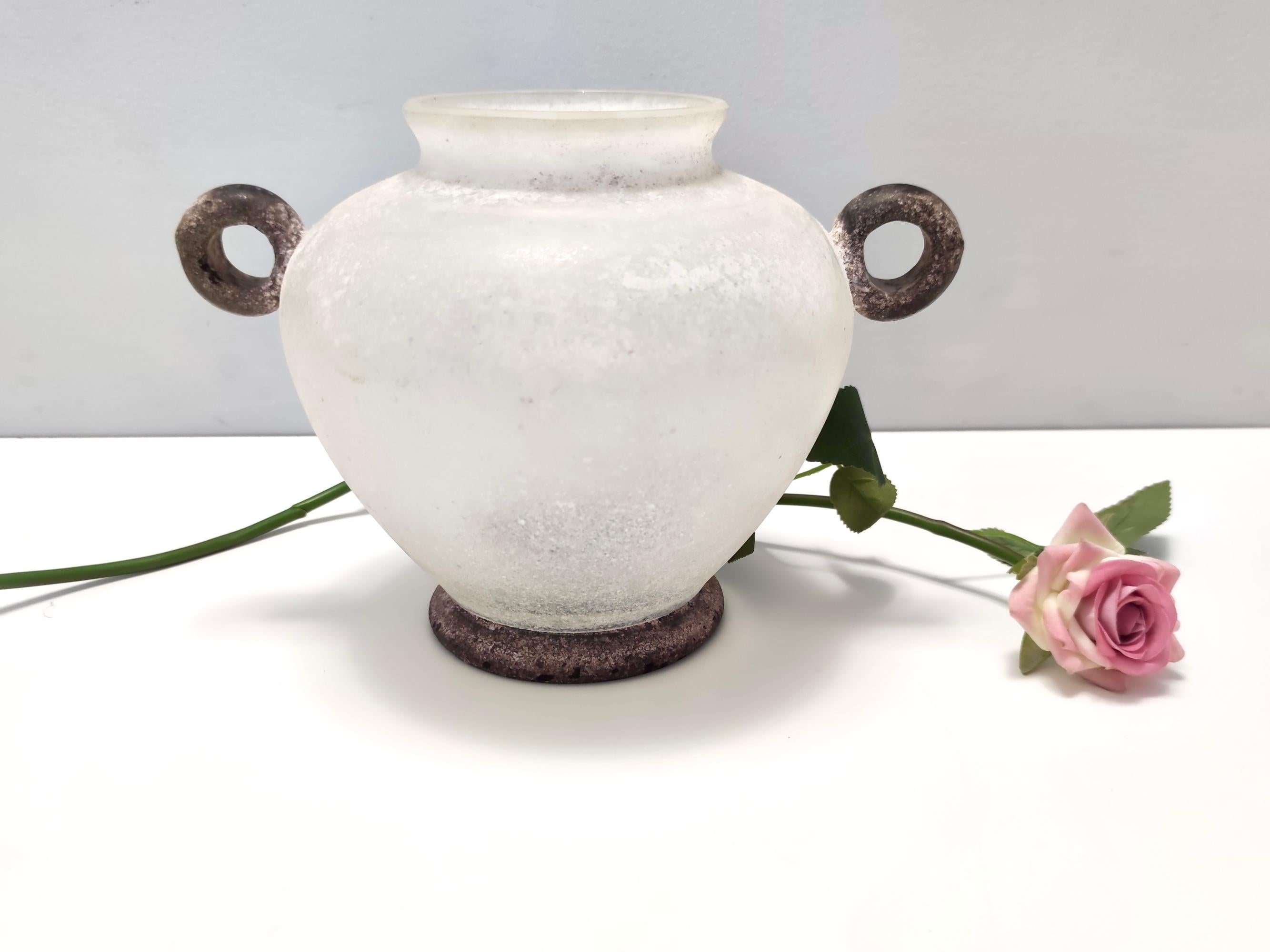Made in Italy, 1970s
It is an amazing piece in hand-blown scavo glass with an intense ornamental and chromatic effect.
This vase is vintage, therefore it might show slight traces of use, but it can be considered as in perfect original