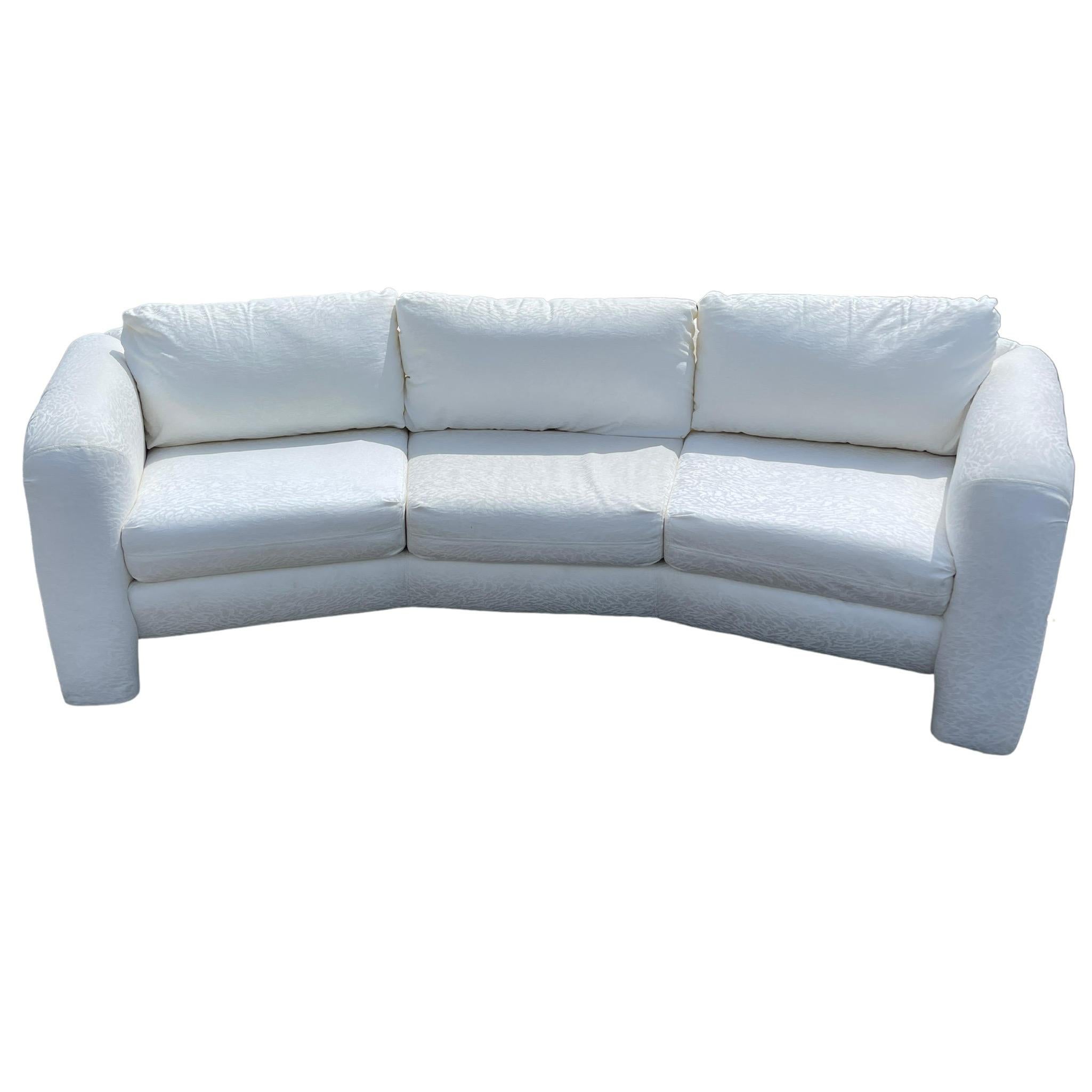 Amazing pair of sculpted sofas by Carson’s. Each feature a white fabric with three seat cushions and back cushions.

Additional information:
Material: Fabric
Color: White
Style: Postmodern
Brand: Carsons
Time Period: 1990s
Place of origin: